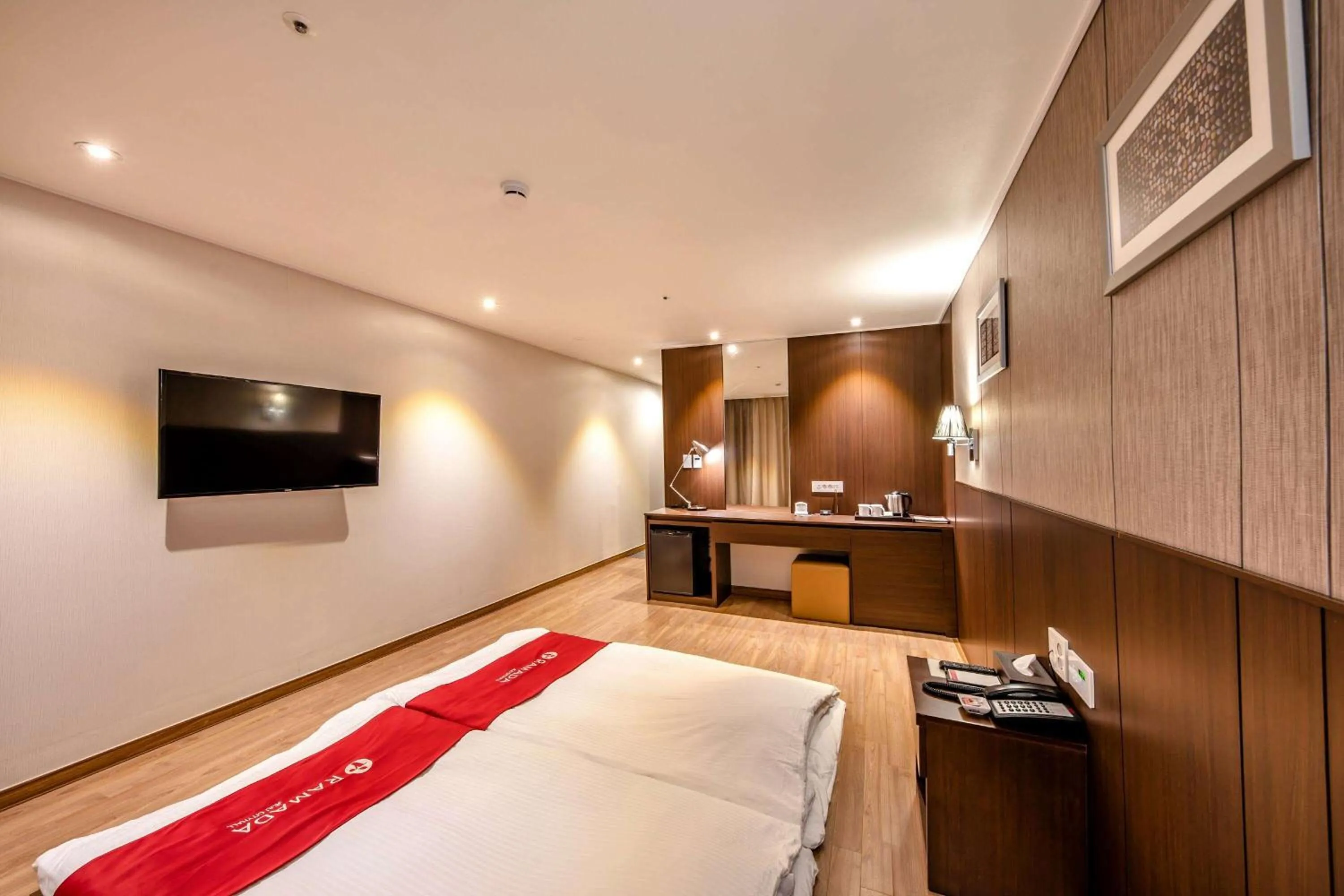 Photo of the whole room, Bed in Ramada by Wyndham Jeju City Hall