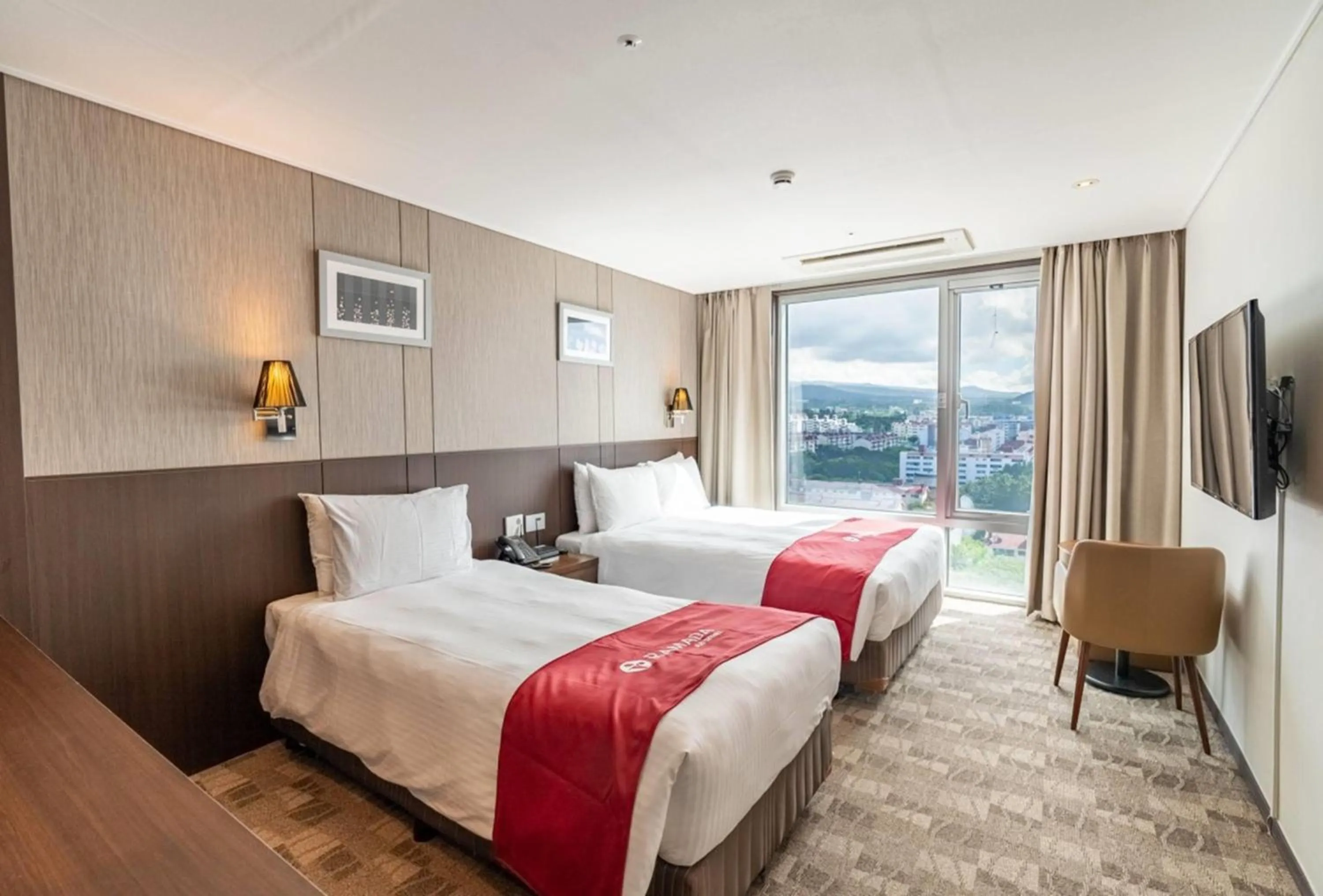 Photo of the whole room, Bed in Ramada by Wyndham Jeju City Hall