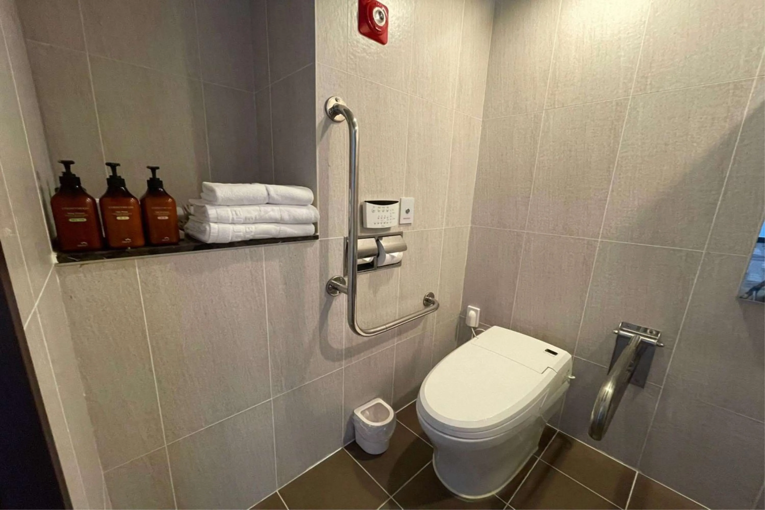 Toilet in Ramada by Wyndham Jeju City Hall