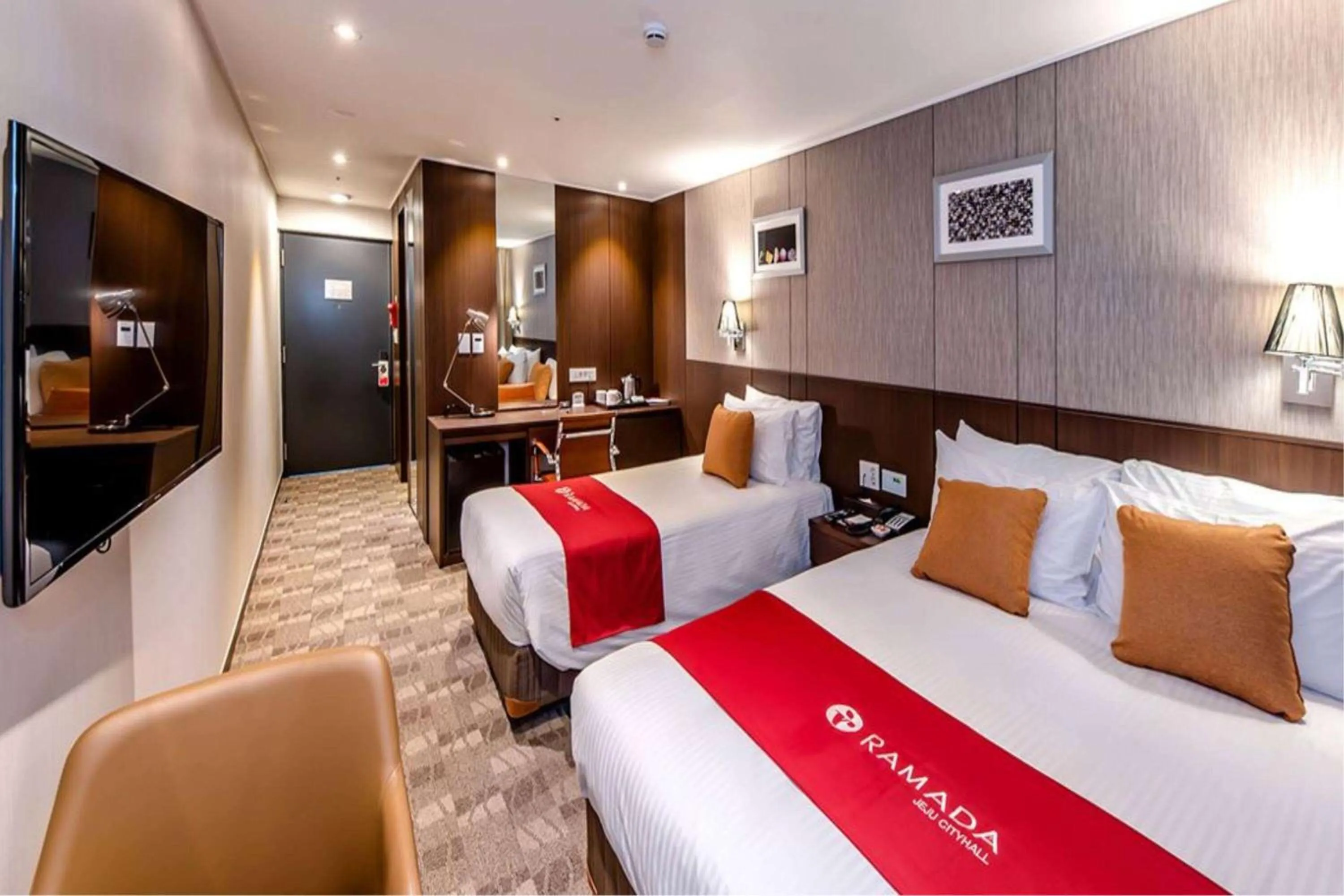 Photo of the whole room, Bed in Ramada by Wyndham Jeju City Hall