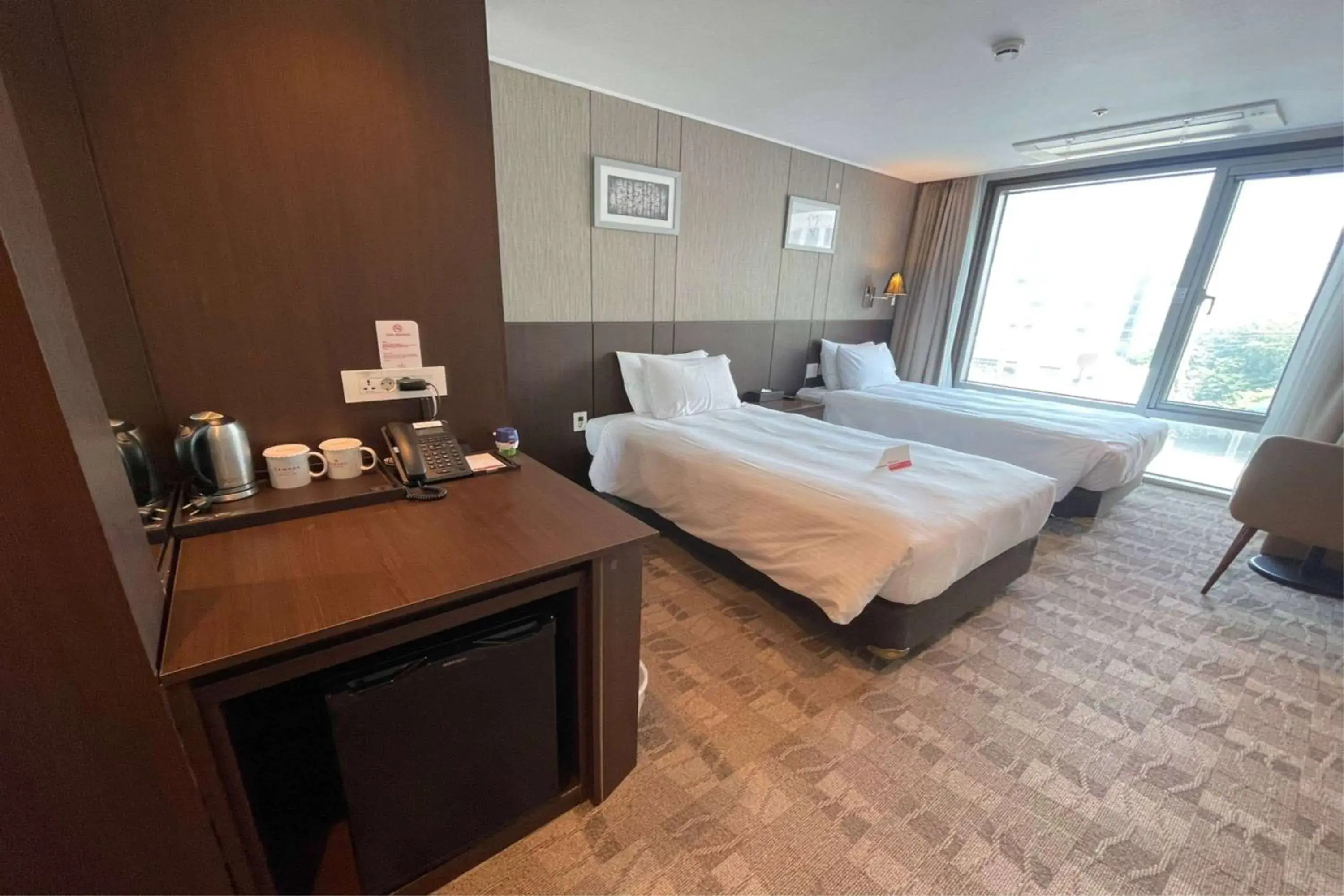 Photo of the whole room, Bed in Ramada by Wyndham Jeju City Hall Photo of the whole room, Bed in Ramada by Wyndham Jeju City Hall