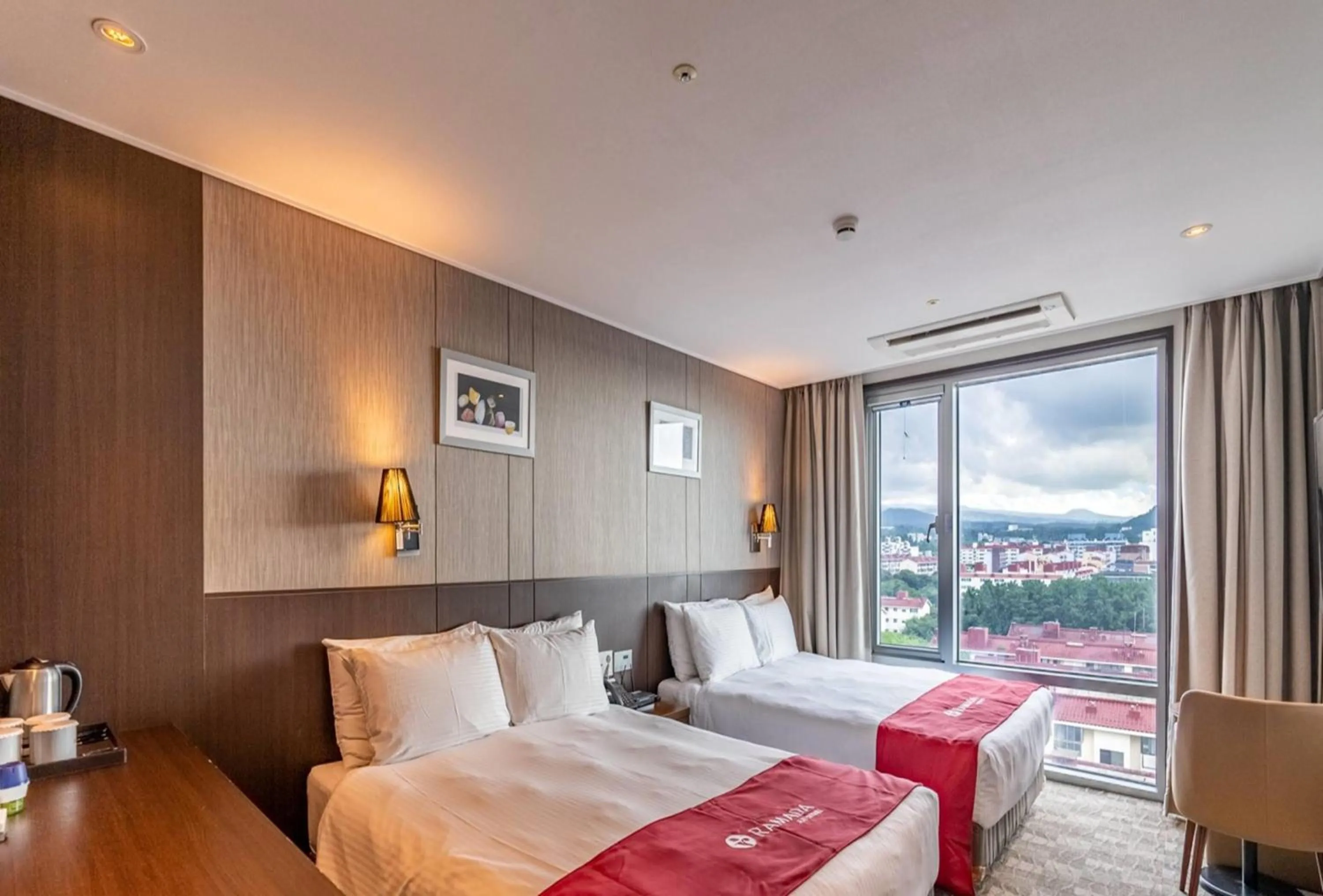 Photo of the whole room, Bed in Ramada by Wyndham Jeju City Hall