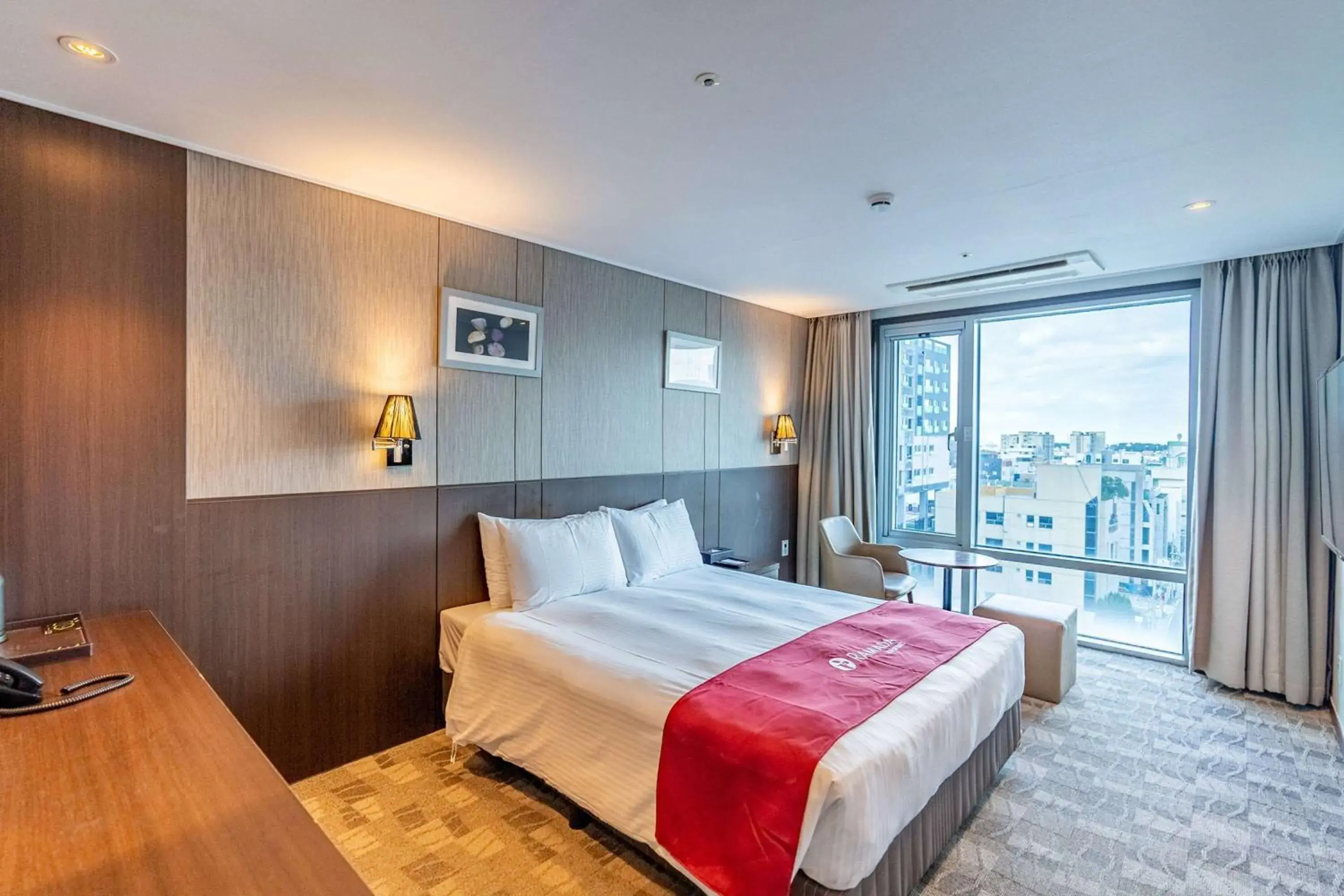 Photo of the whole room, Bed in Ramada by Wyndham Jeju City Hall Photo of the whole room, Bed in Ramada by Wyndham Jeju City Hall