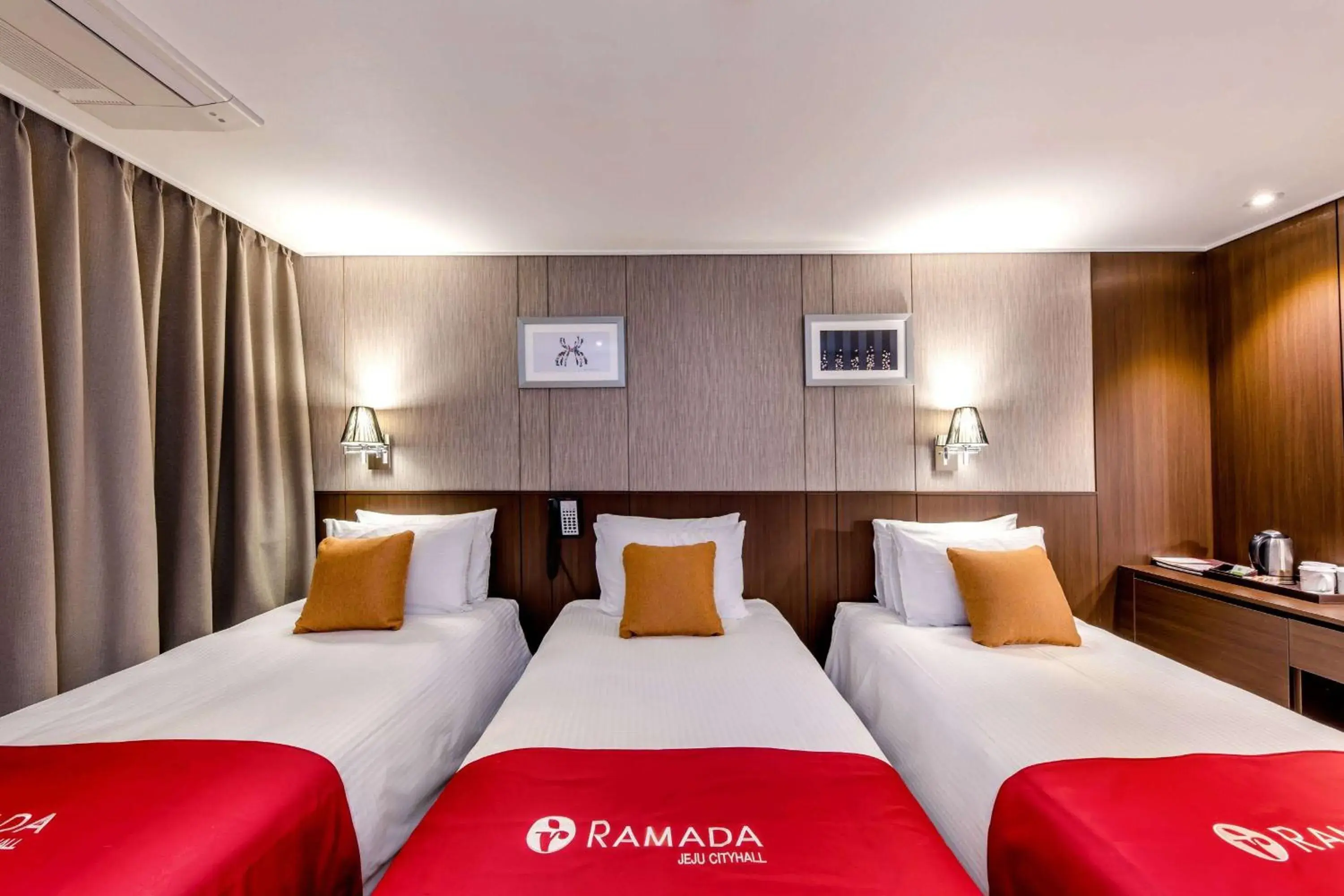 Photo of the whole room, Bed in Ramada by Wyndham Jeju City Hall Photo of the whole room, Bed in Ramada by Wyndham Jeju City Hall