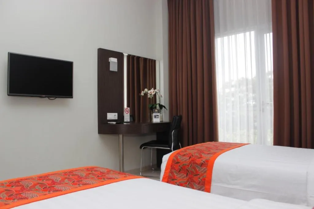 Communal lounge/ TV room, Bed in Moscato Hotel