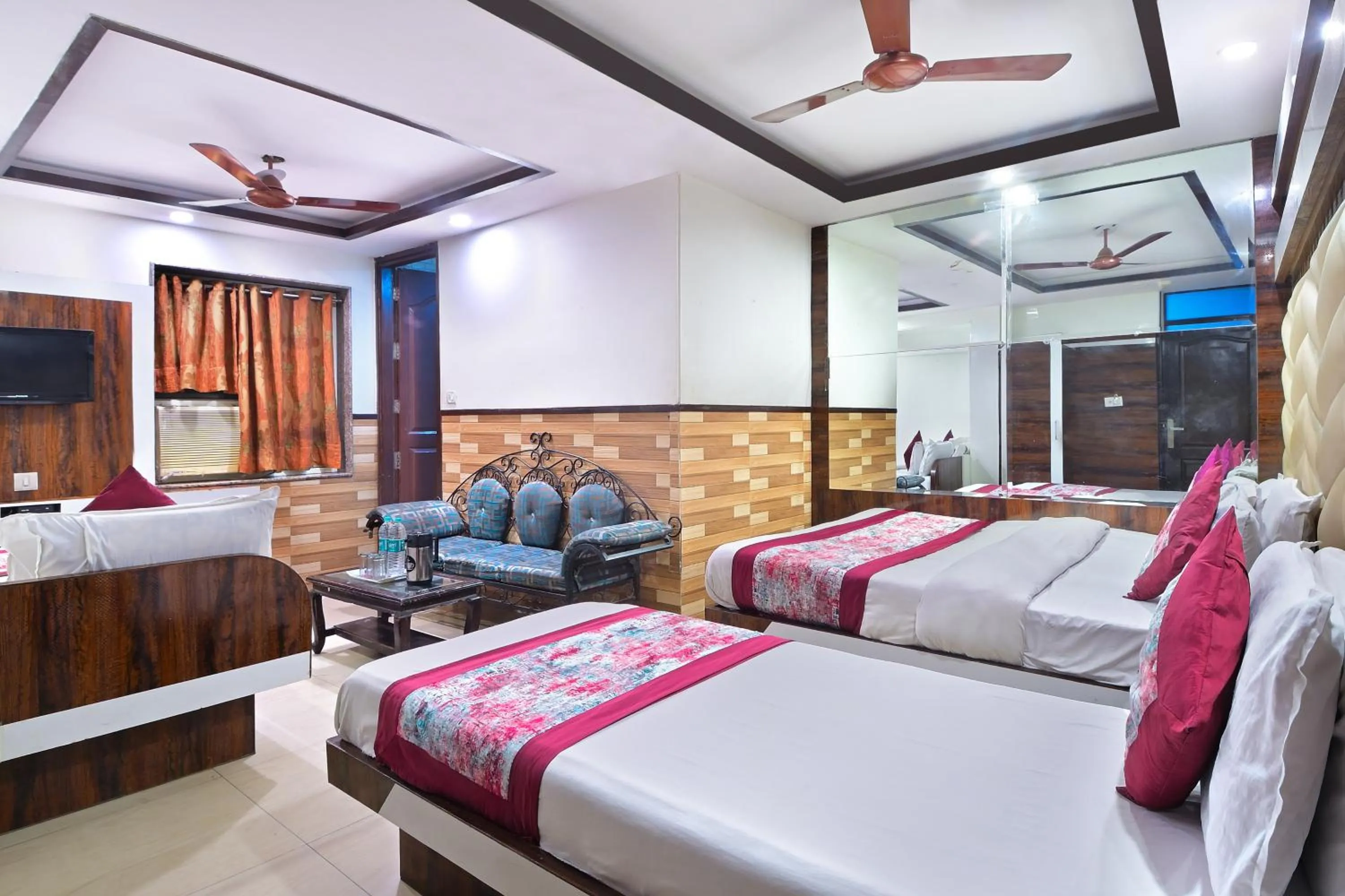 Seating area, Bed in Hotel Glow Inn Paharganj-3 Mins Walk From New Delhi Railway Station