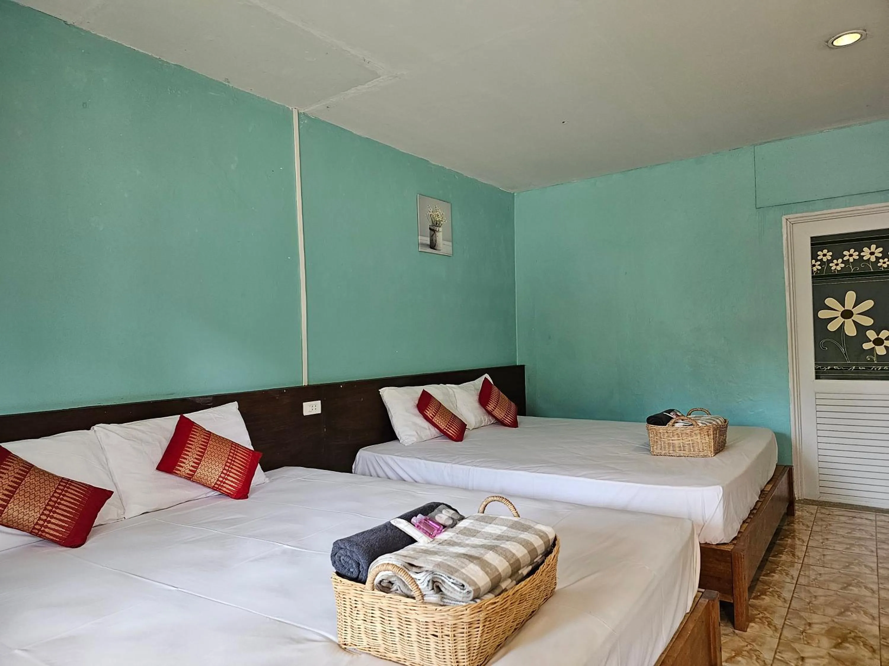 Bed in Koh Ngai Kaimuk Thong Resort