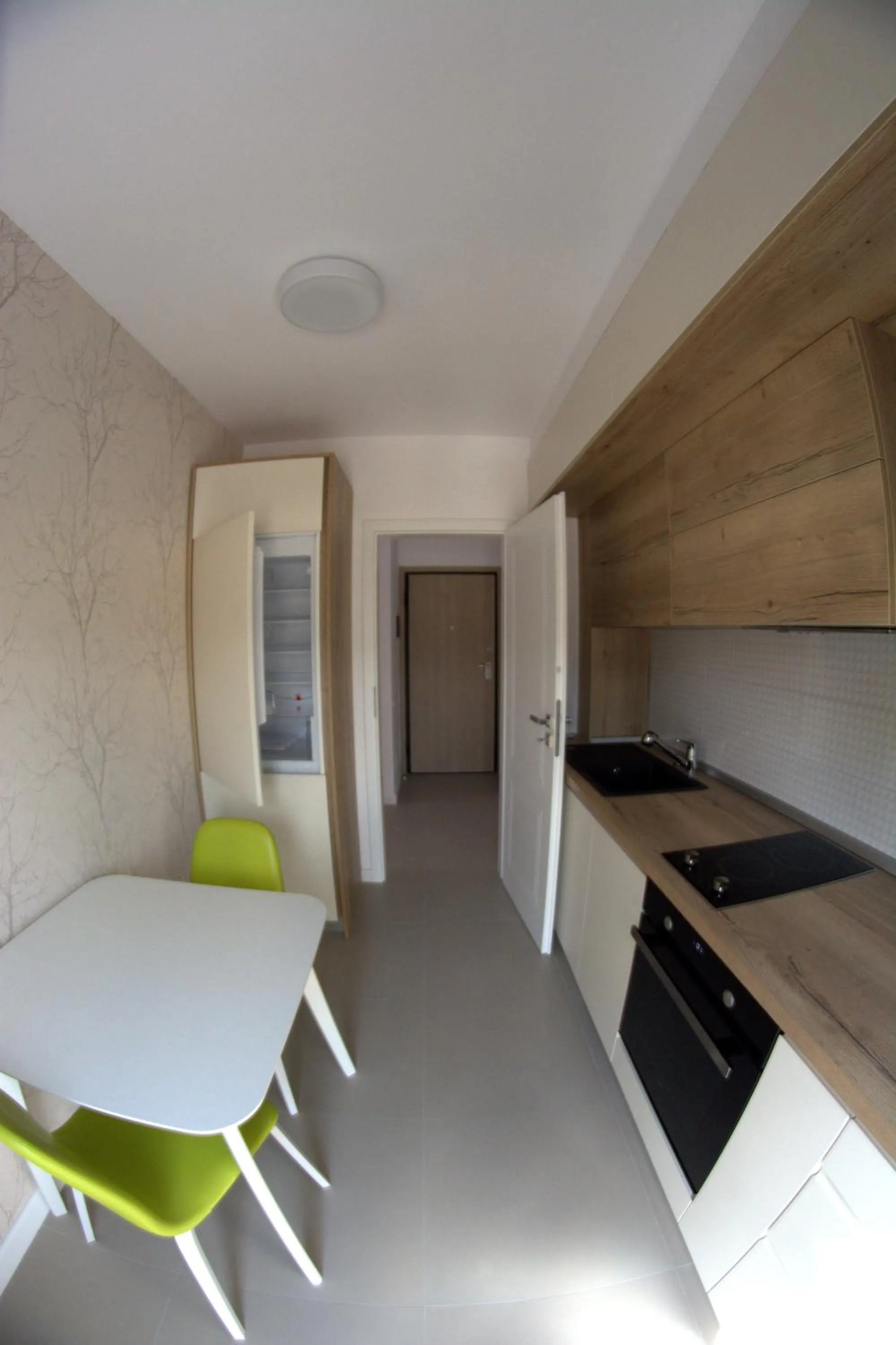 Kitchen or kitchenette in UBA Accommodation Aparthotel