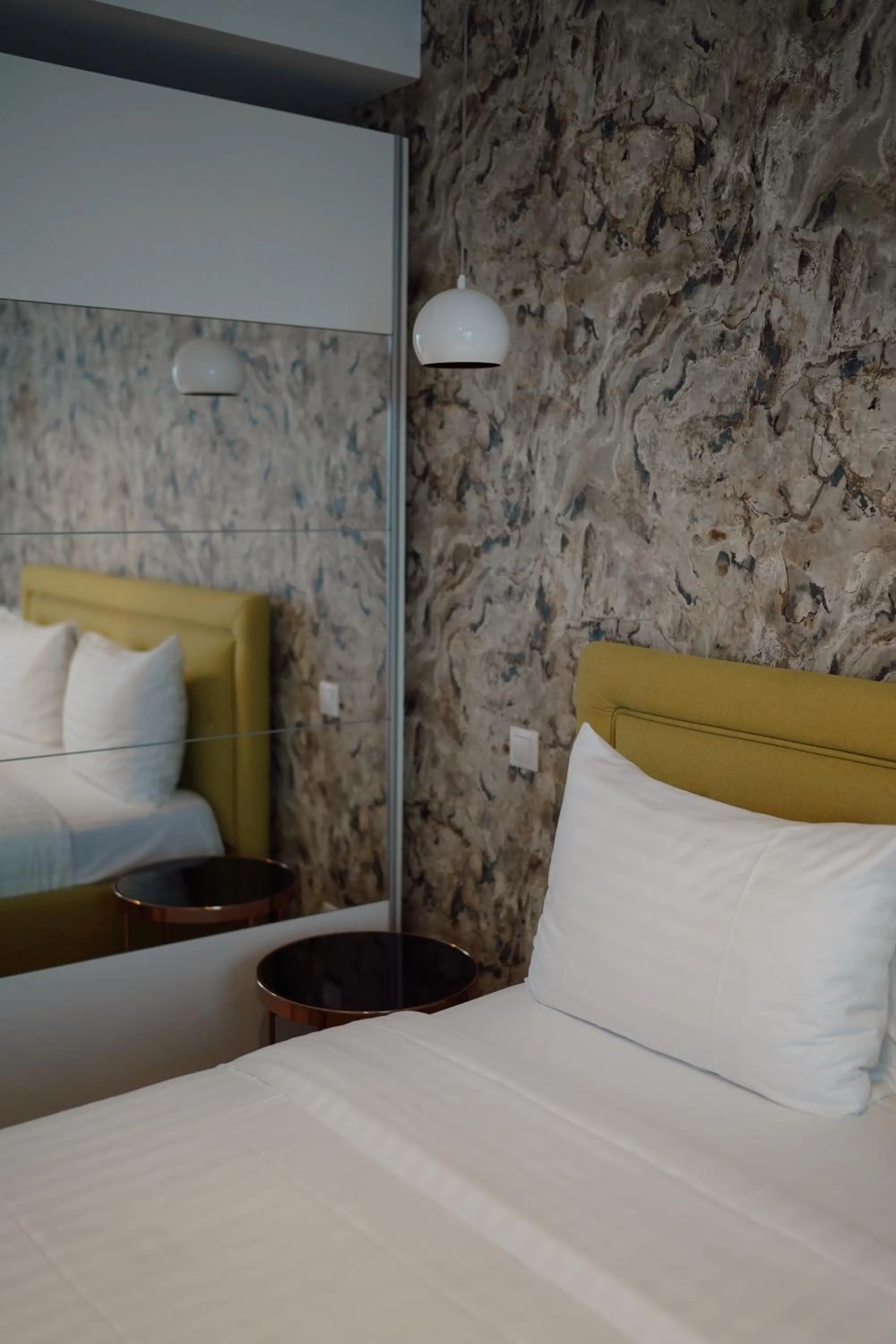 Bed in UBA Accommodation Aparthotel