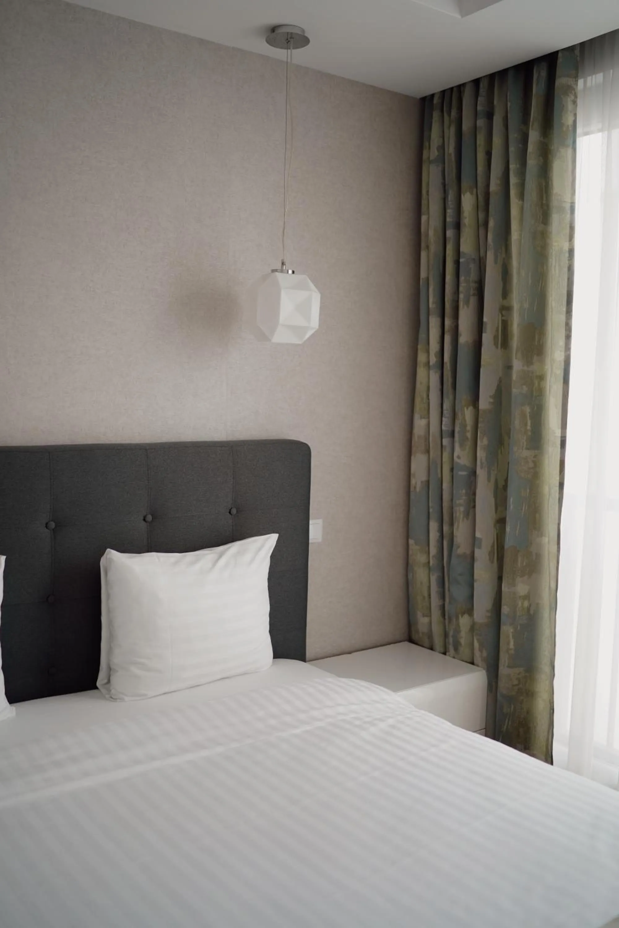 Bed in UBA Accommodation Aparthotel