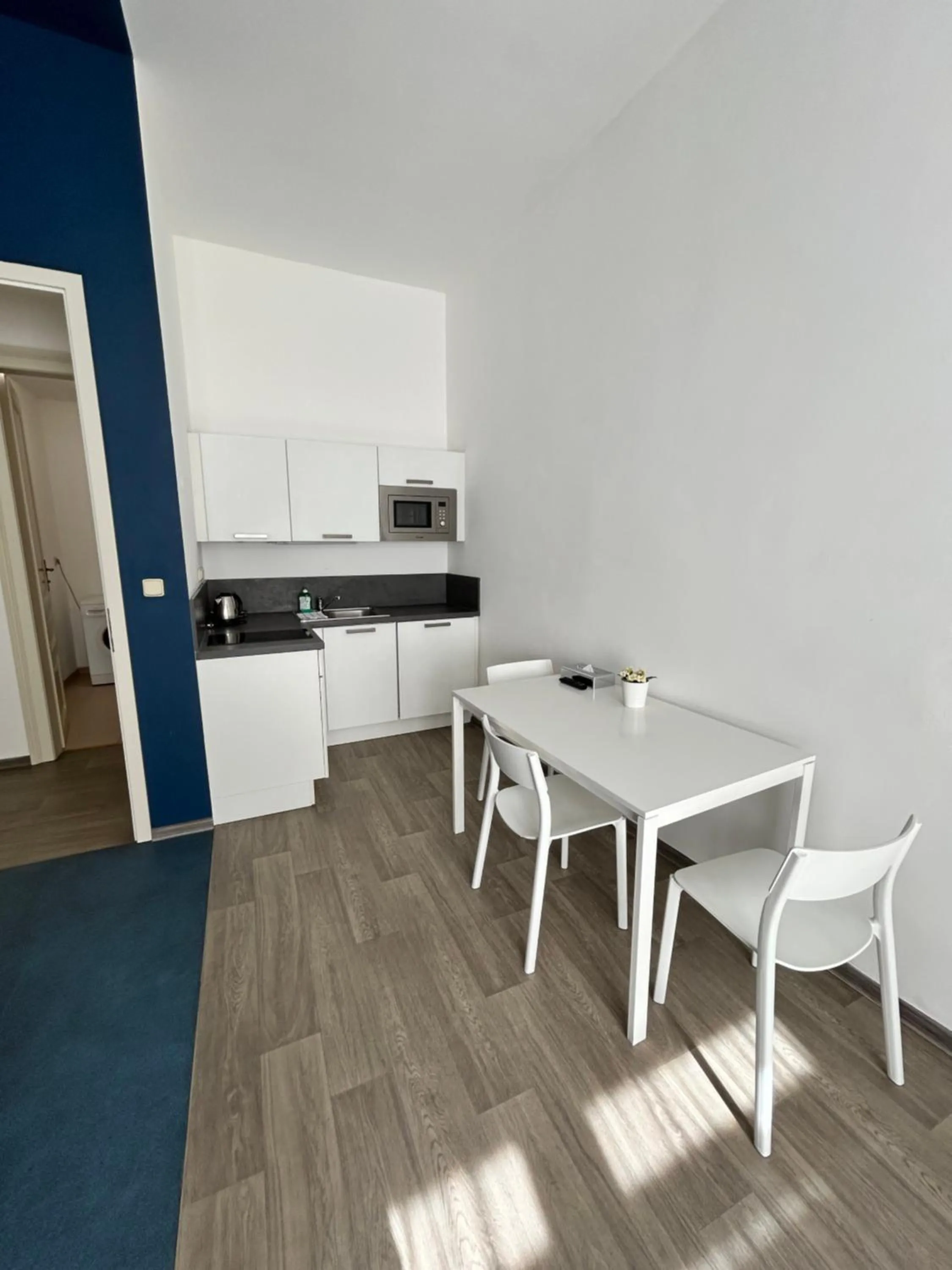 Kitchen or kitchenette in Alveo Suites