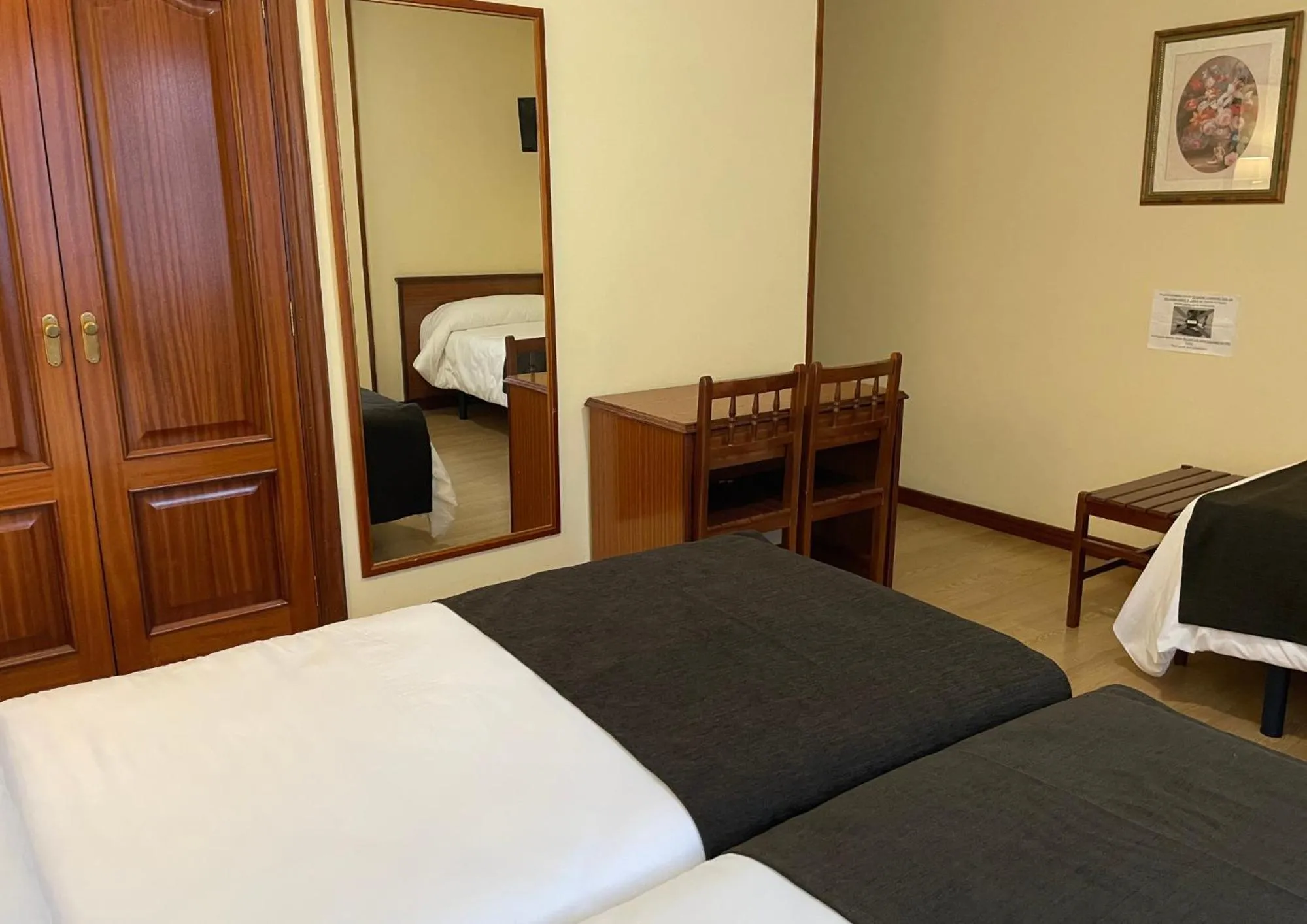 Bed in Pensión Capital de Galicia