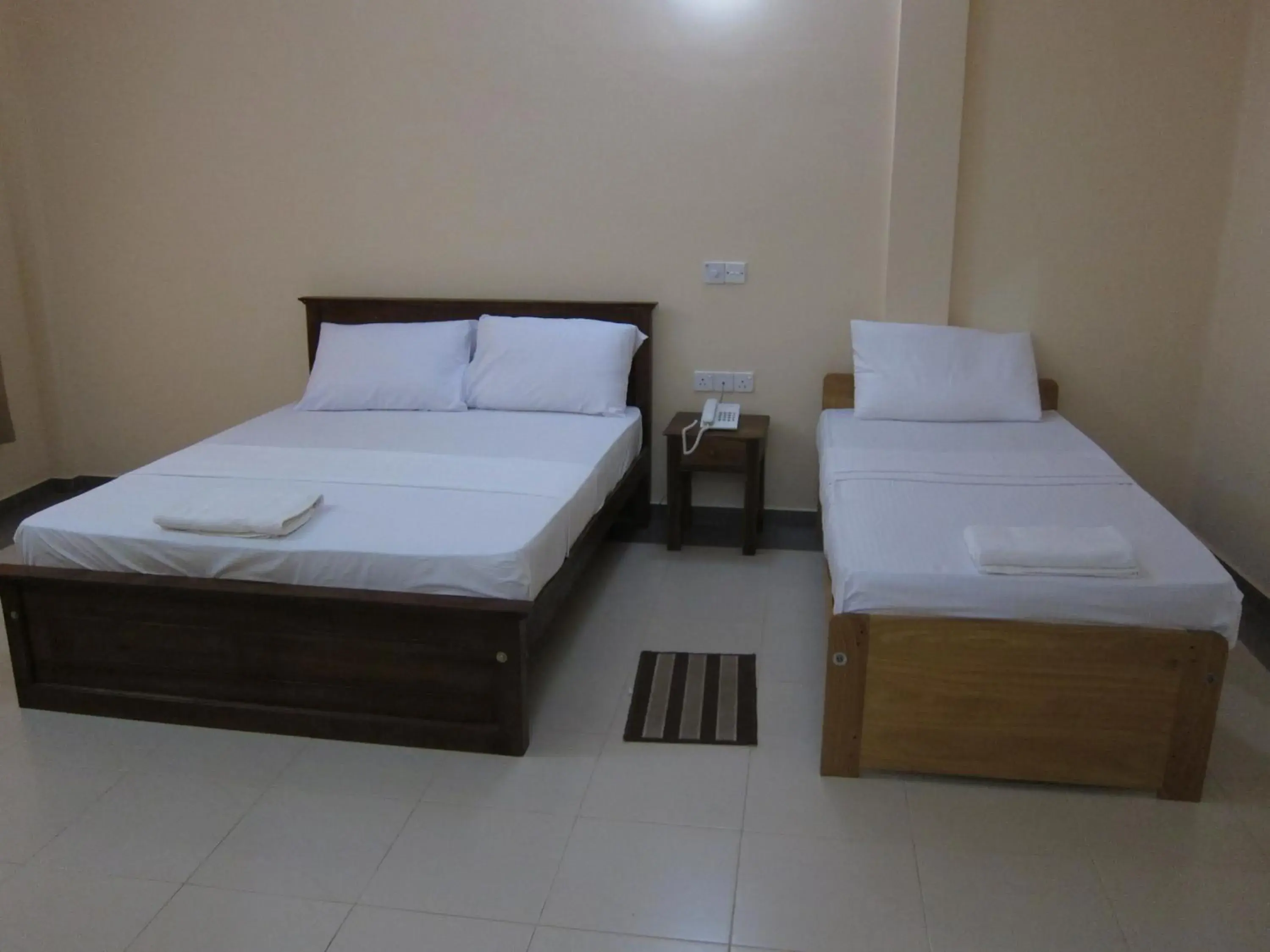 Comfort Triple Room - single occupancy in Hotel Oviya Comfort Triple Room - single occupancy in Hotel Oviya