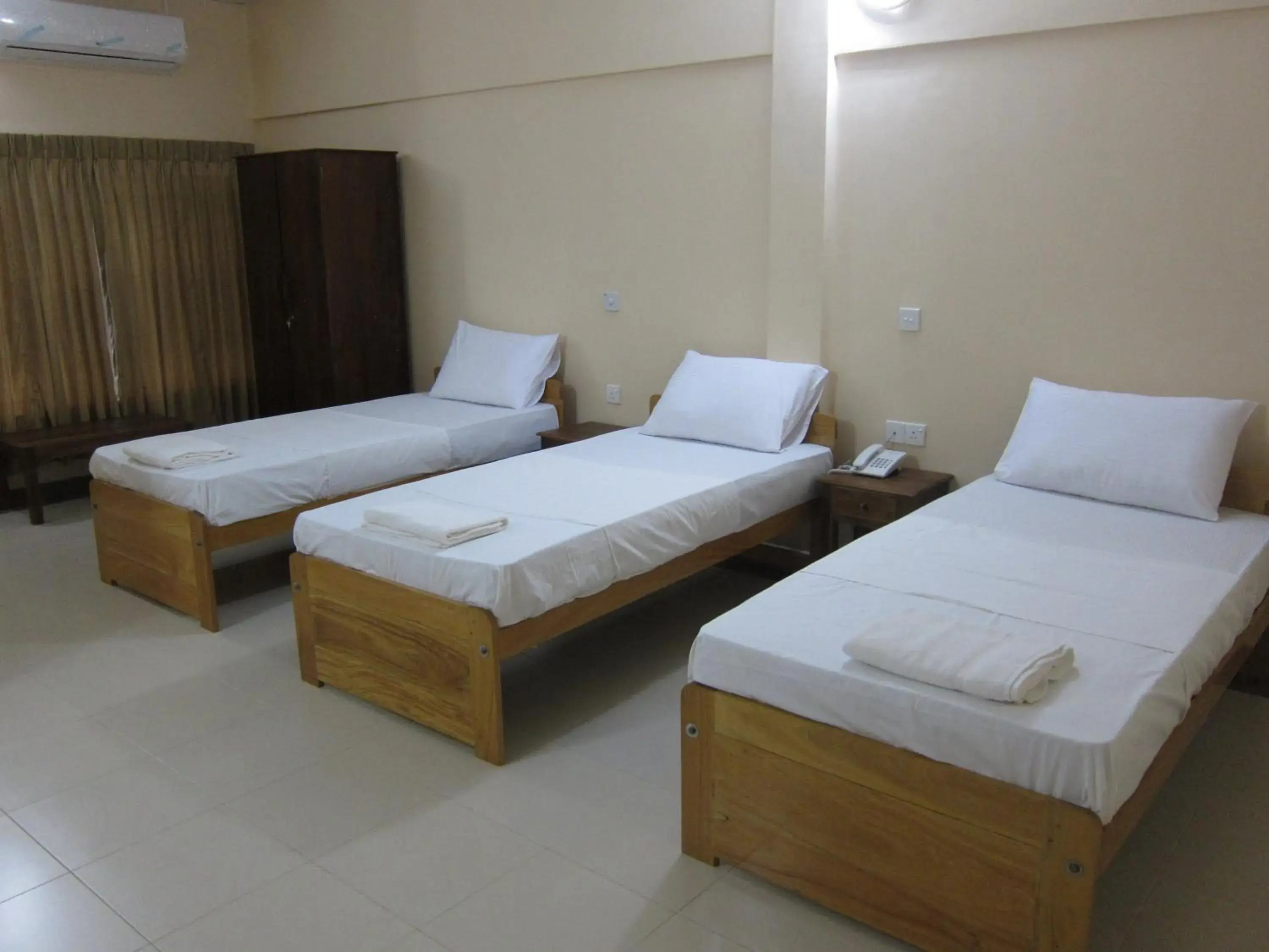 Bed in Hotel Oviya Bed in Hotel Oviya