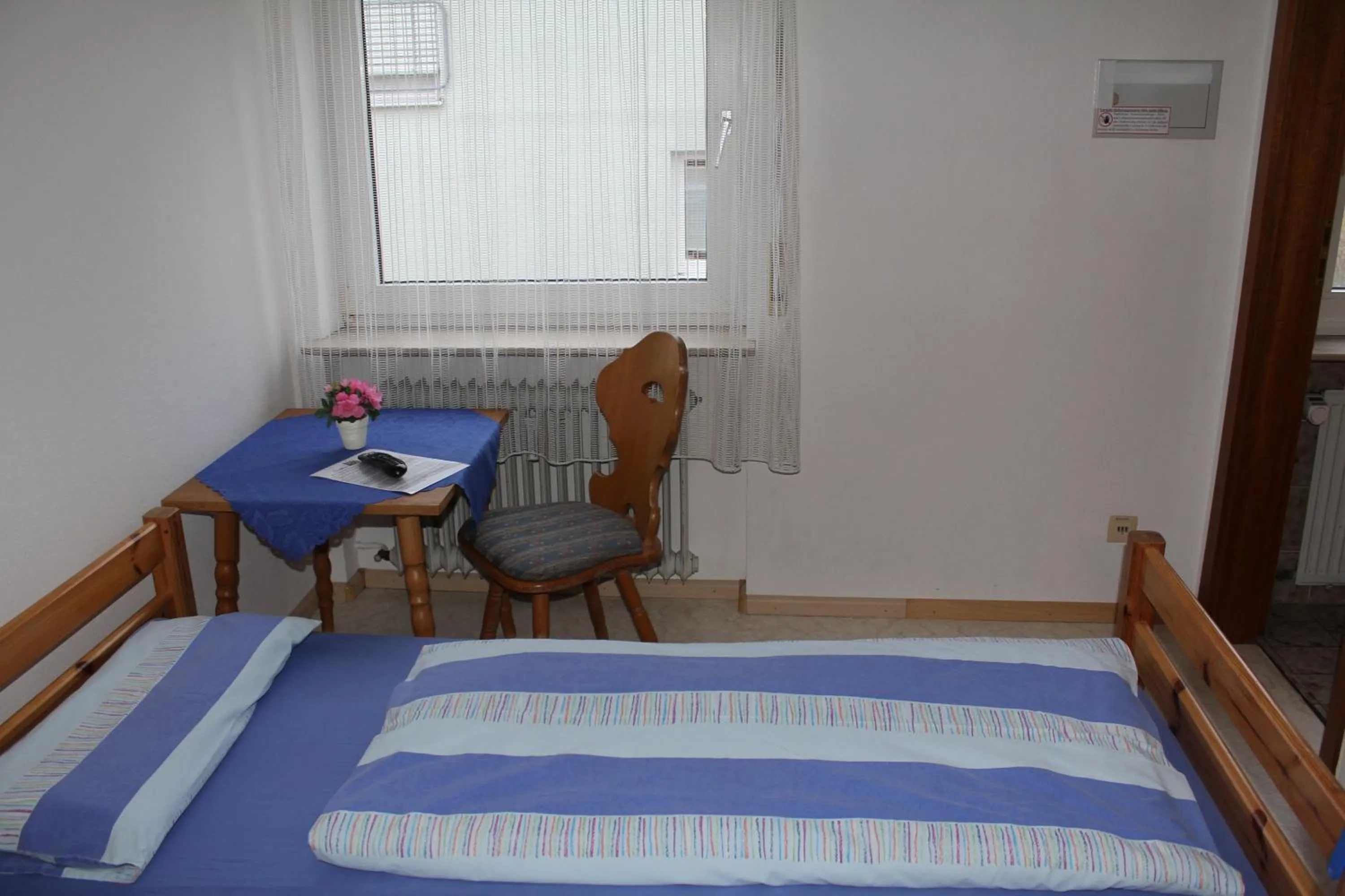 Photo of the whole room, Bed in Gasthaus Mösle