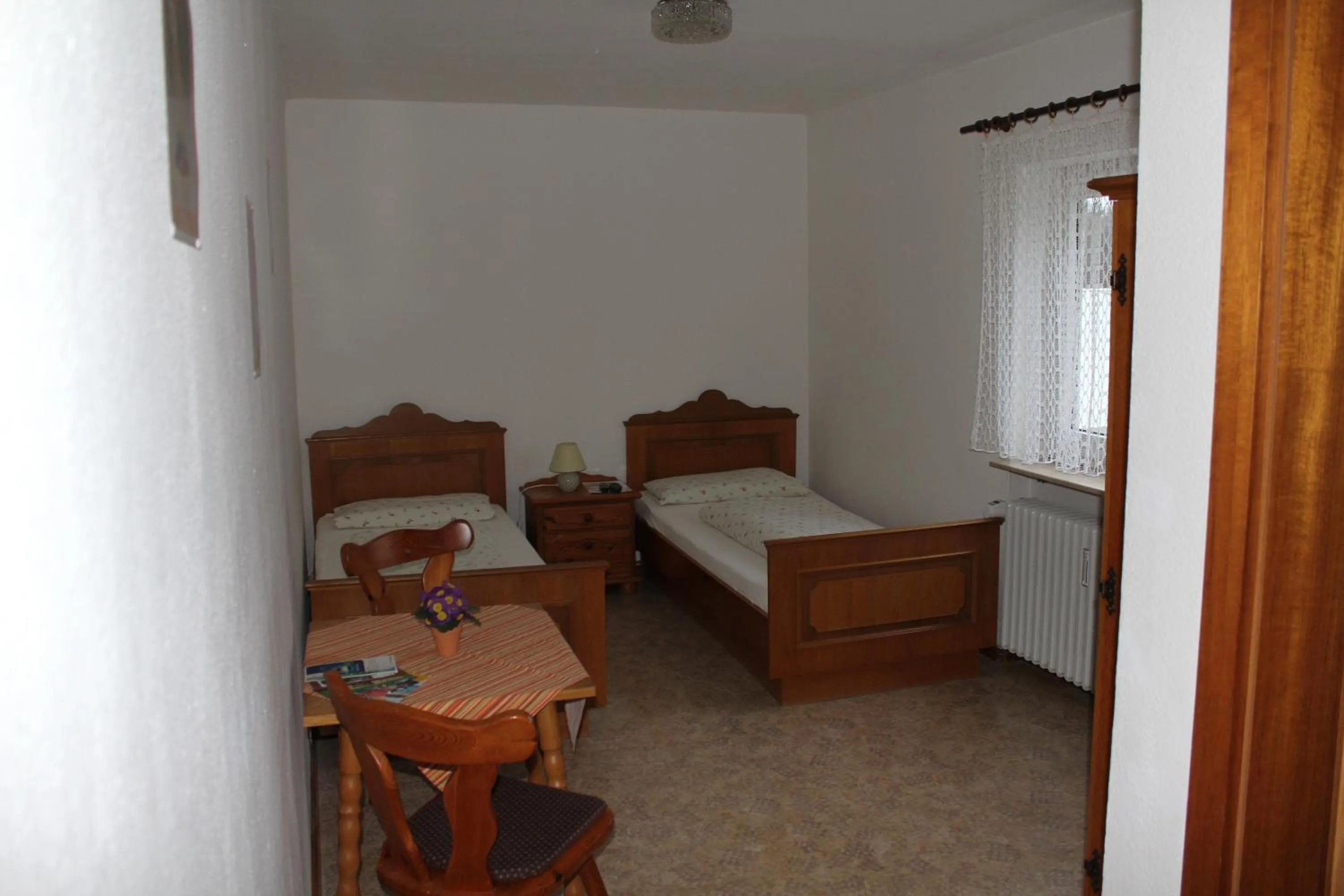 Photo of the whole room, Bed in Gasthaus Mösle