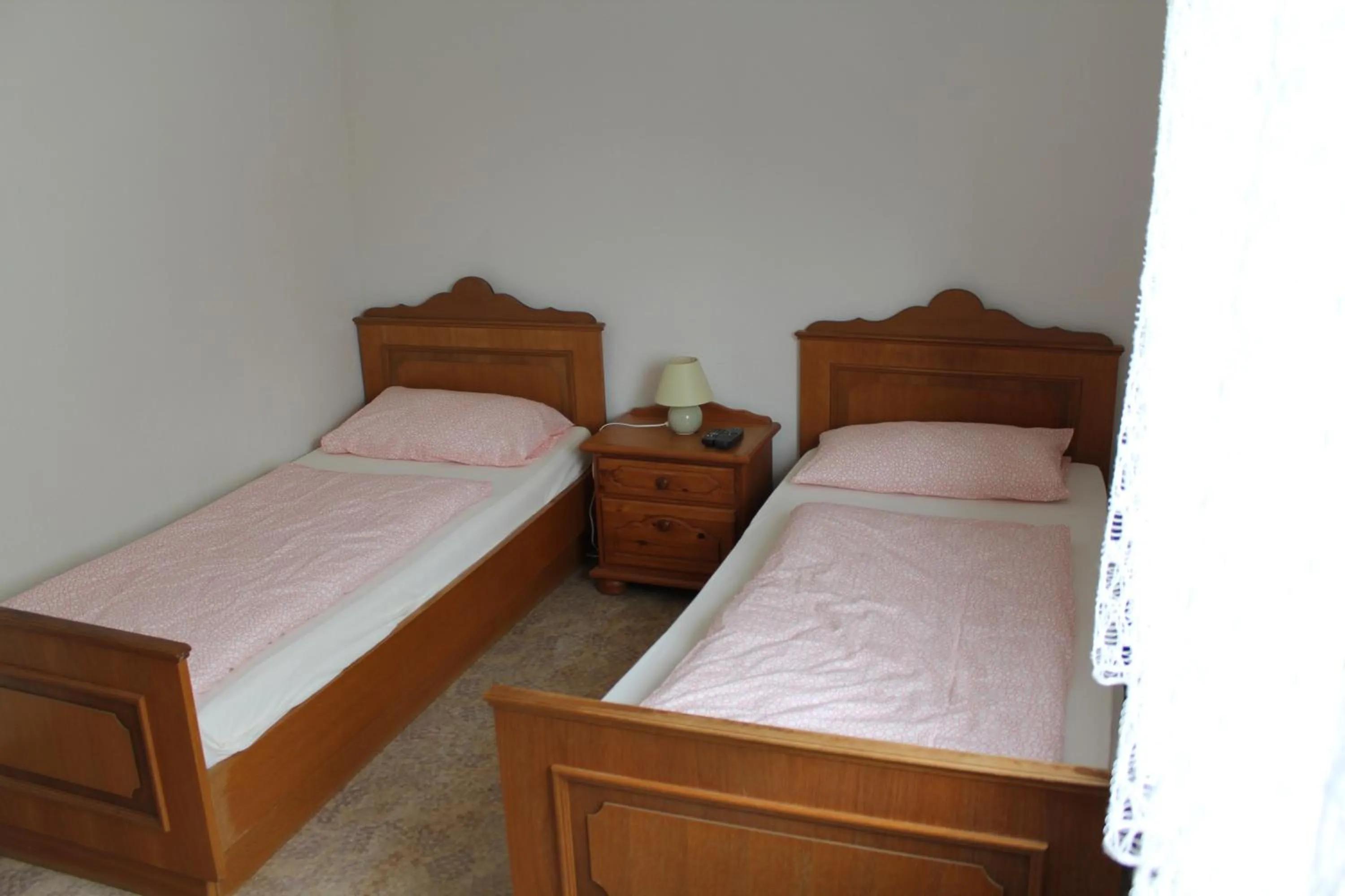 Photo of the whole room, Bed in Gasthaus Mösle