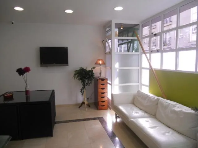 Communal lounge/ TV room in Albergue la Estacion Santiago de Compostela