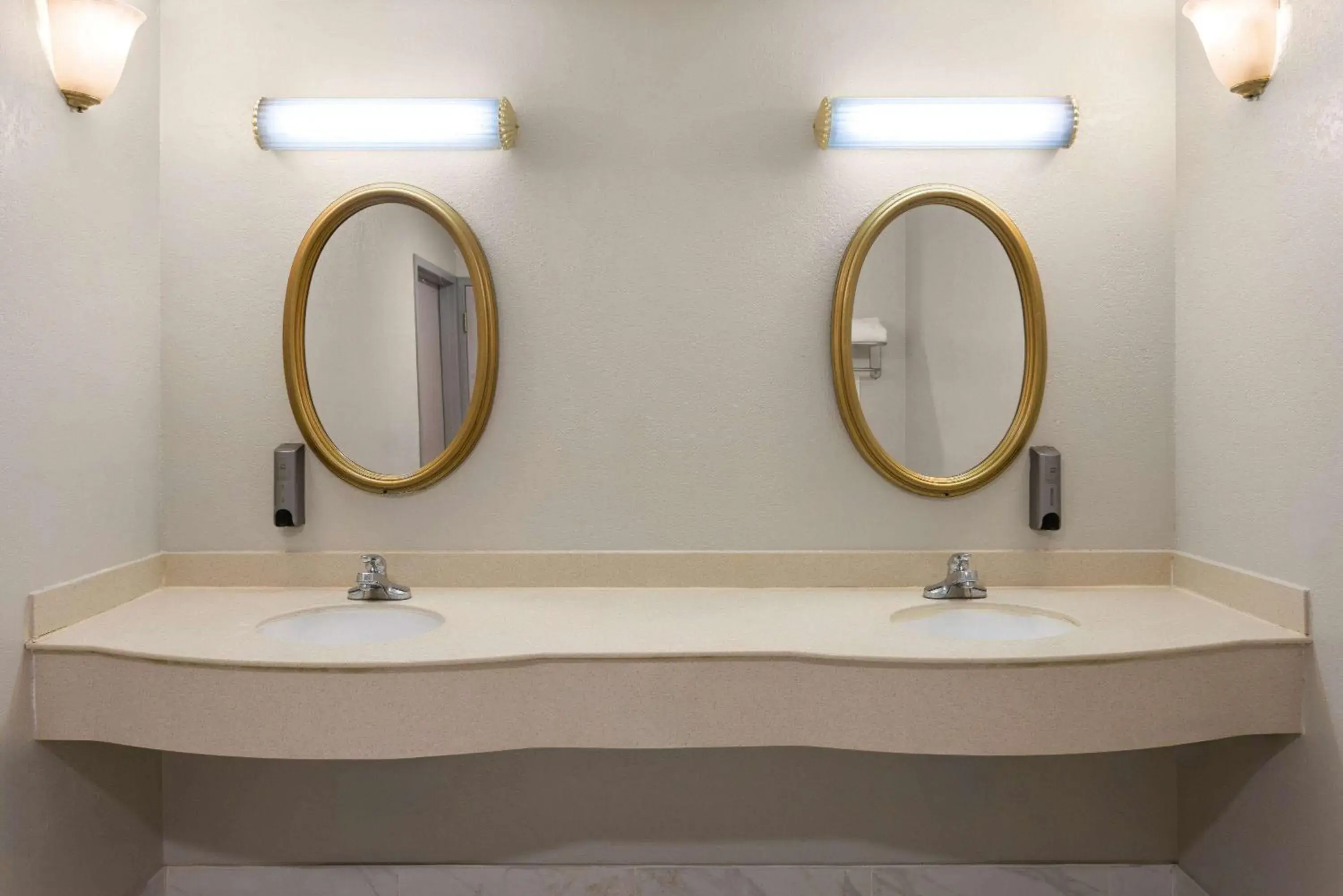 Bathroom in Days Inn & Suites by Wyndham Albany Bathroom in Days Inn & Suites by Wyndham Albany