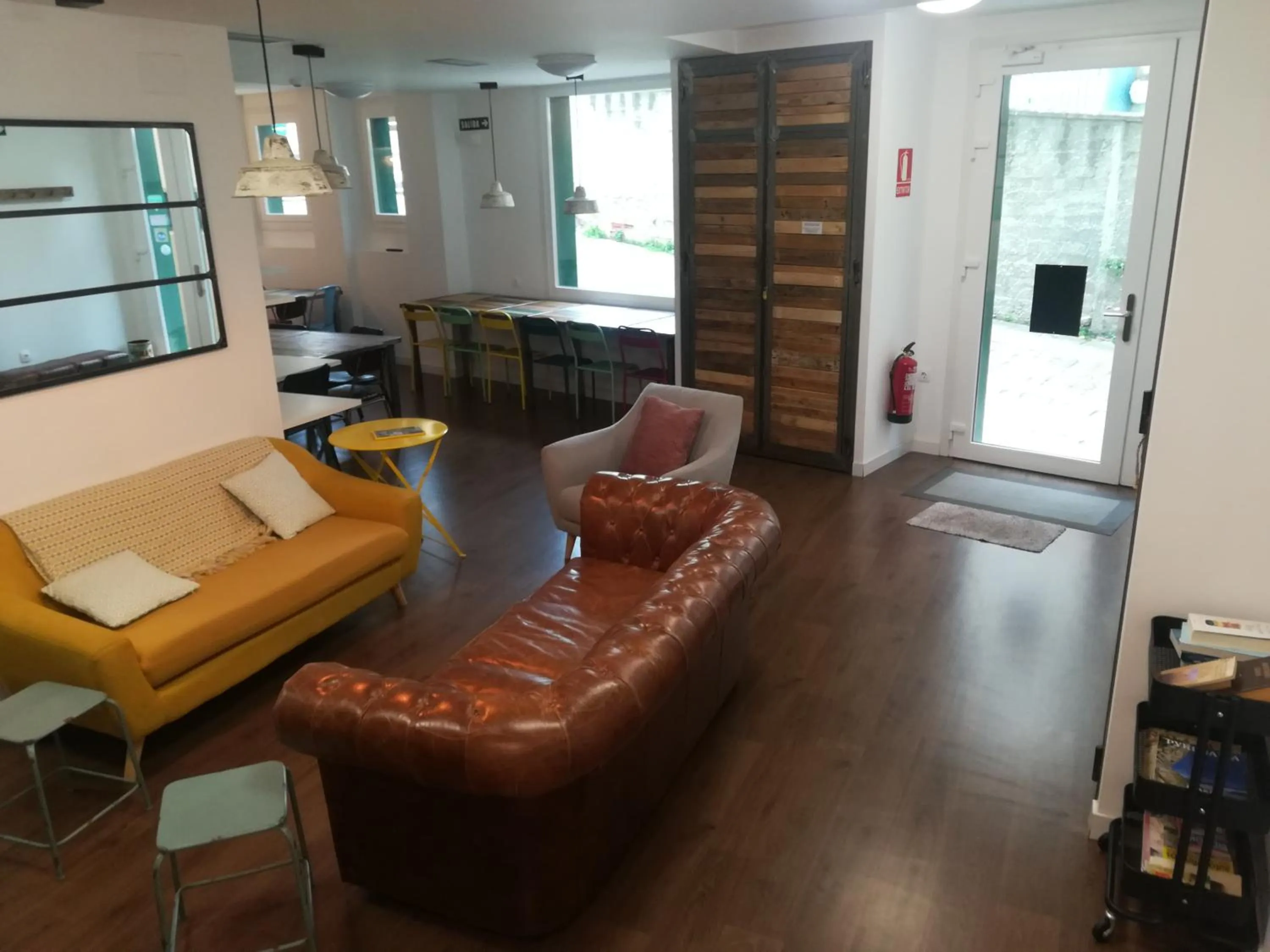 Communal lounge/ TV room in Agora Hostel