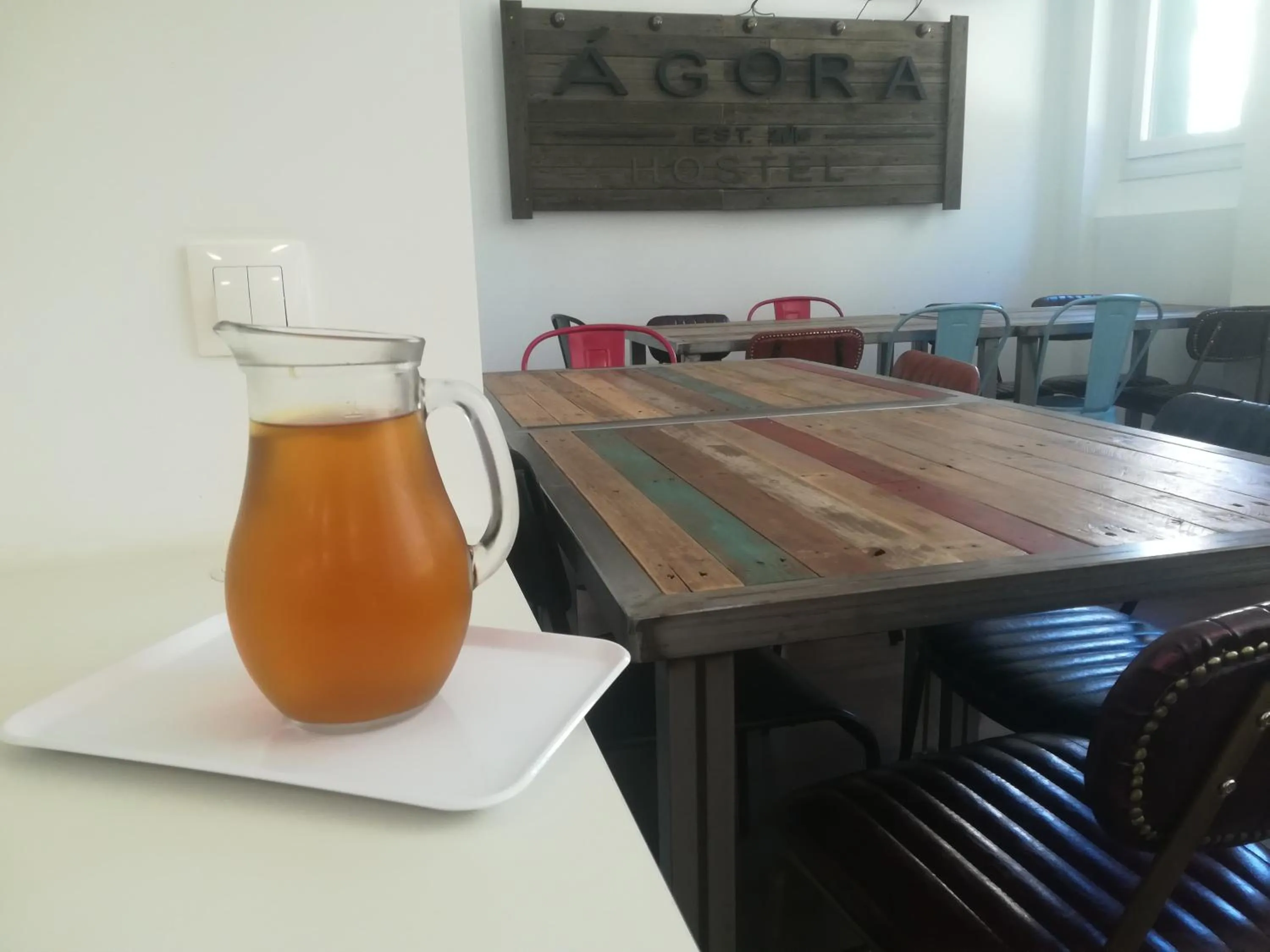 Communal lounge/ TV room in Agora Hostel