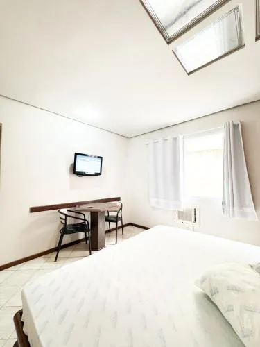 Photo of the whole room, Bed in Golfinho Hotel (Adults Only)