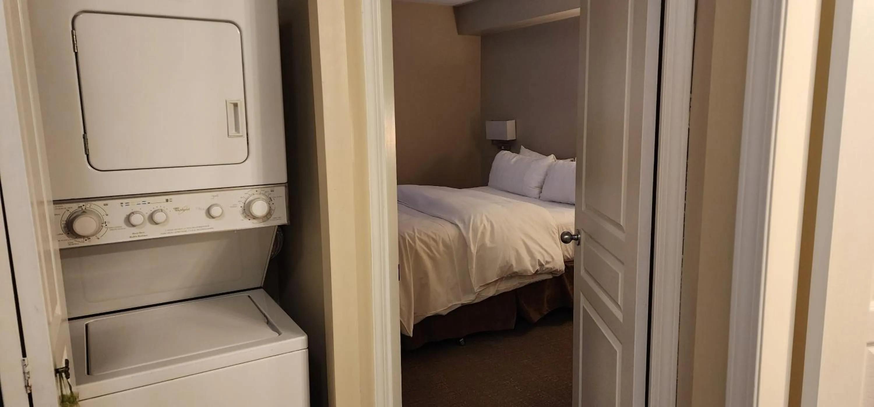 Bed in Times Square Suites Hotel