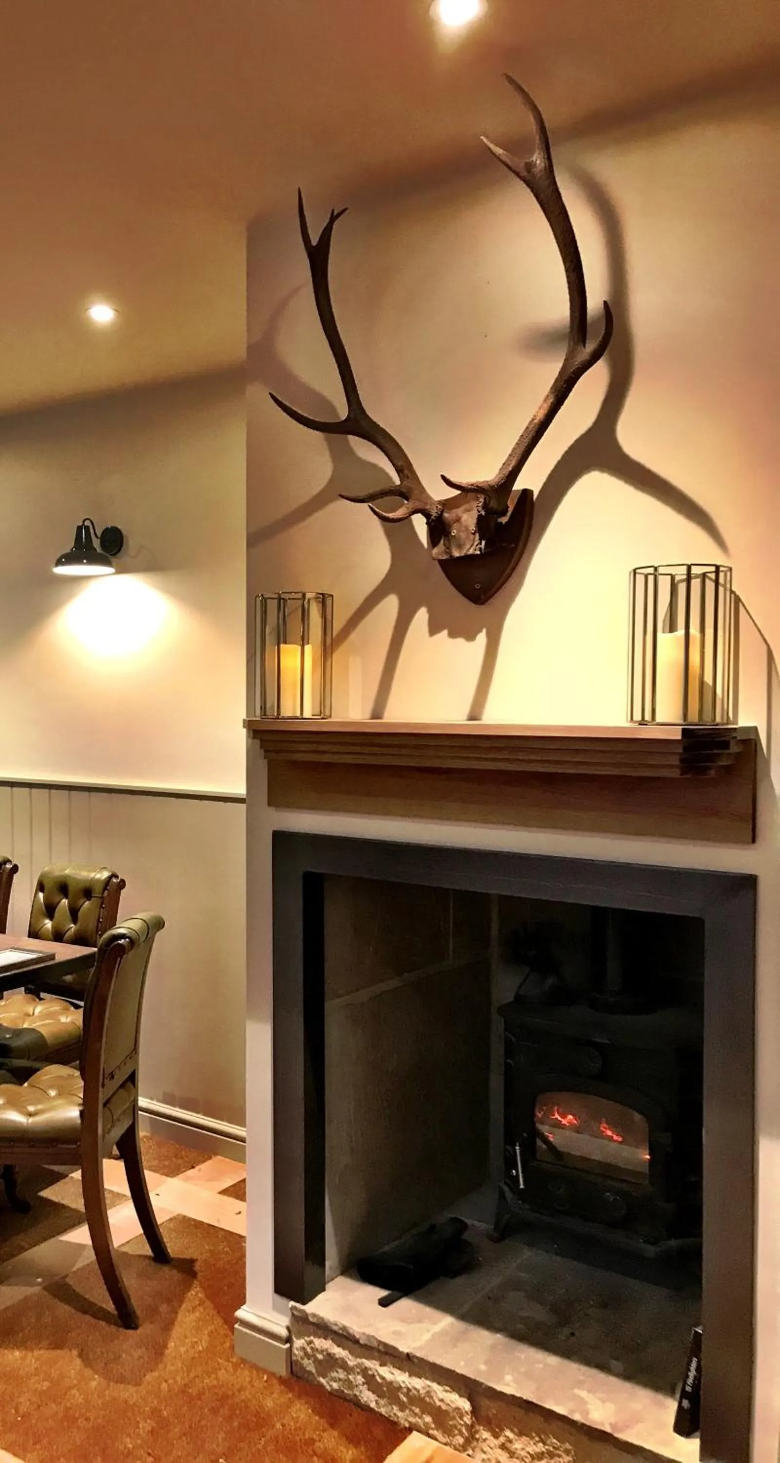 Communal lounge/ TV room in The Moon Inn at Stoney Middleton