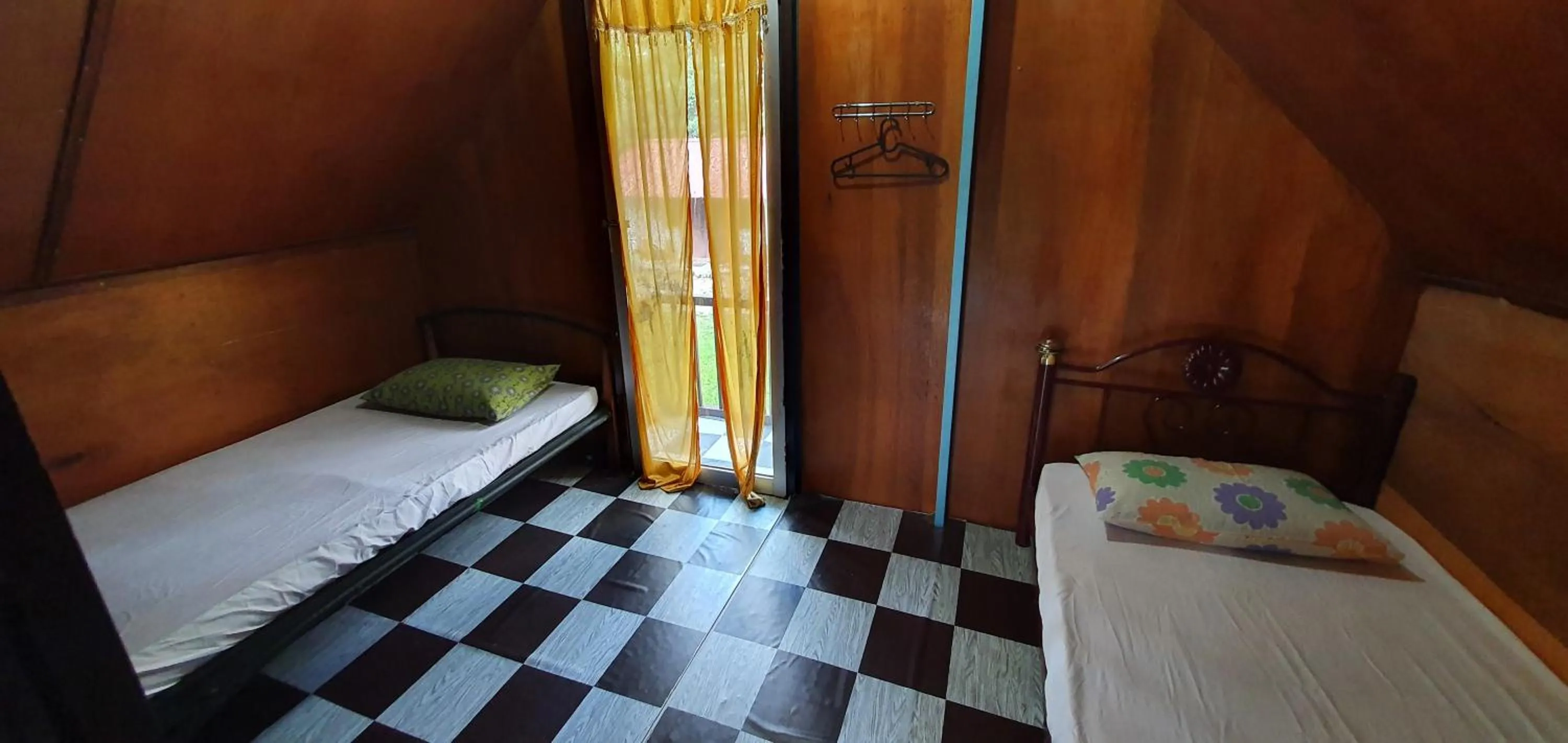 Bed in Chalet Kampong Semawar