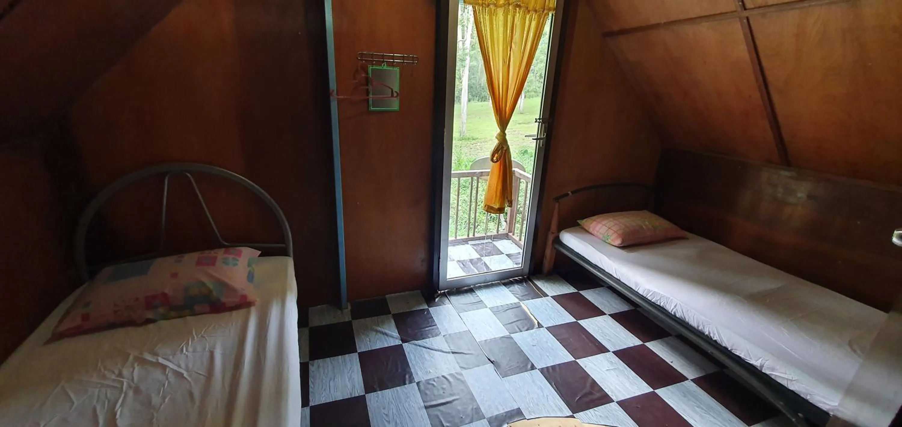 Bed in Chalet Kampong Semawar