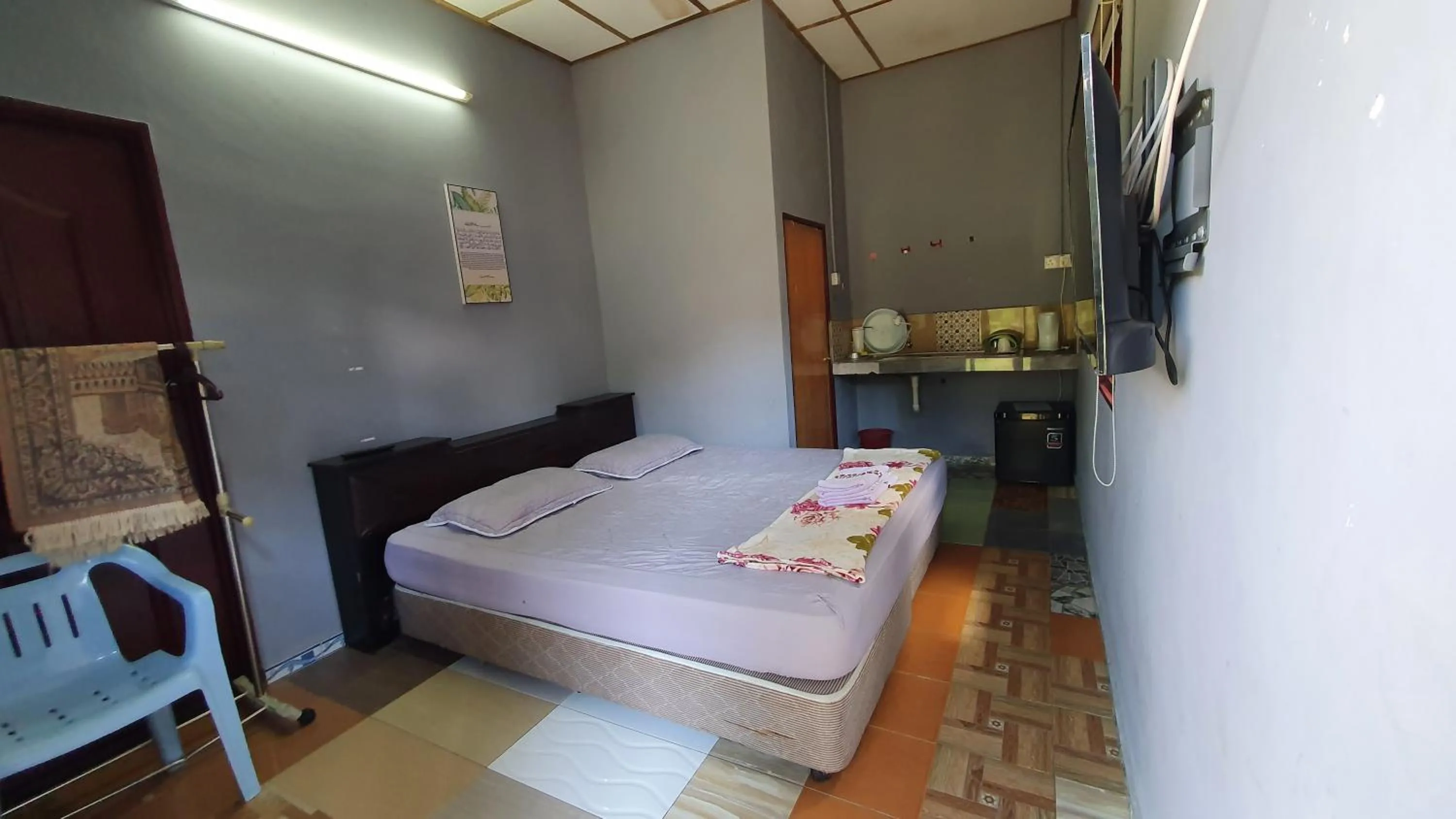 Bed in Chalet Kampong Semawar