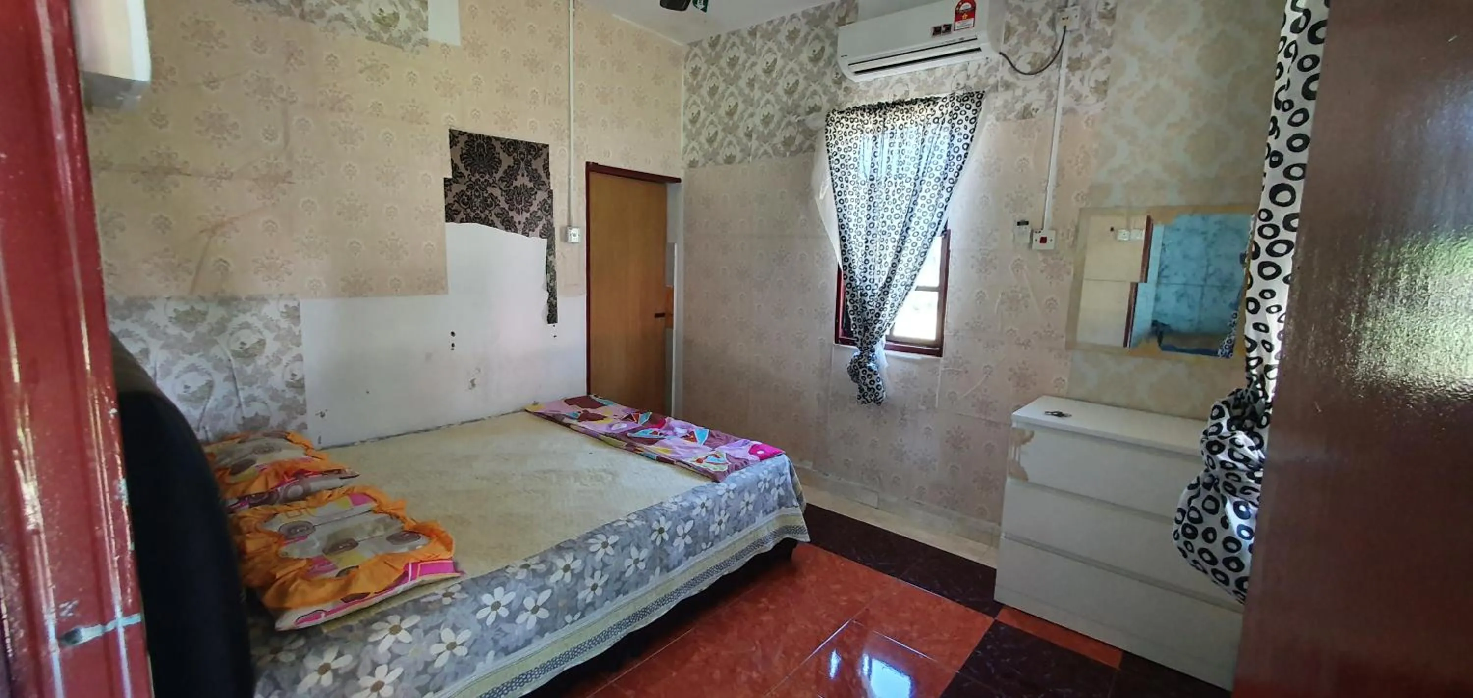 Bed in Chalet Kampong Semawar