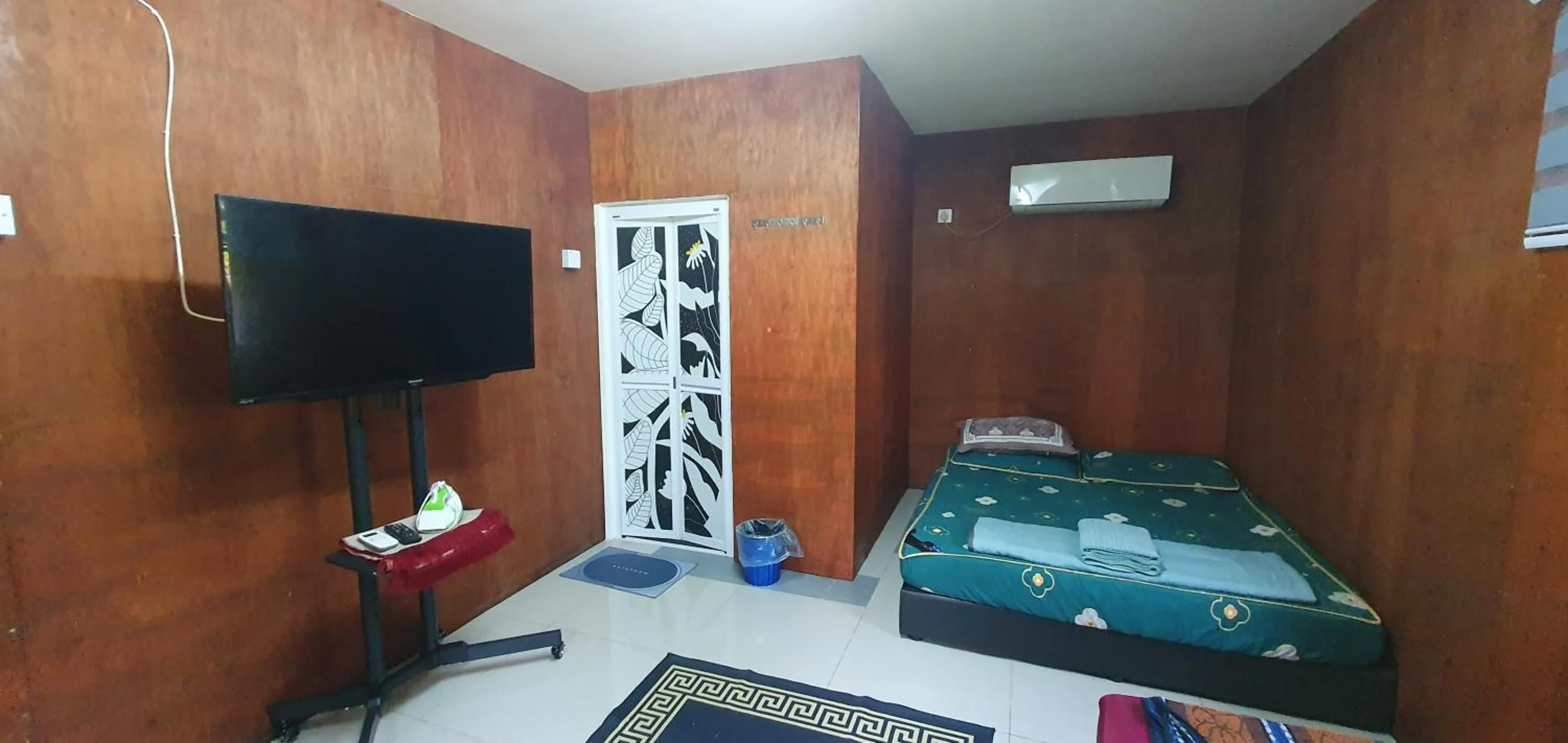 Bed in Chalet Kampong Semawar