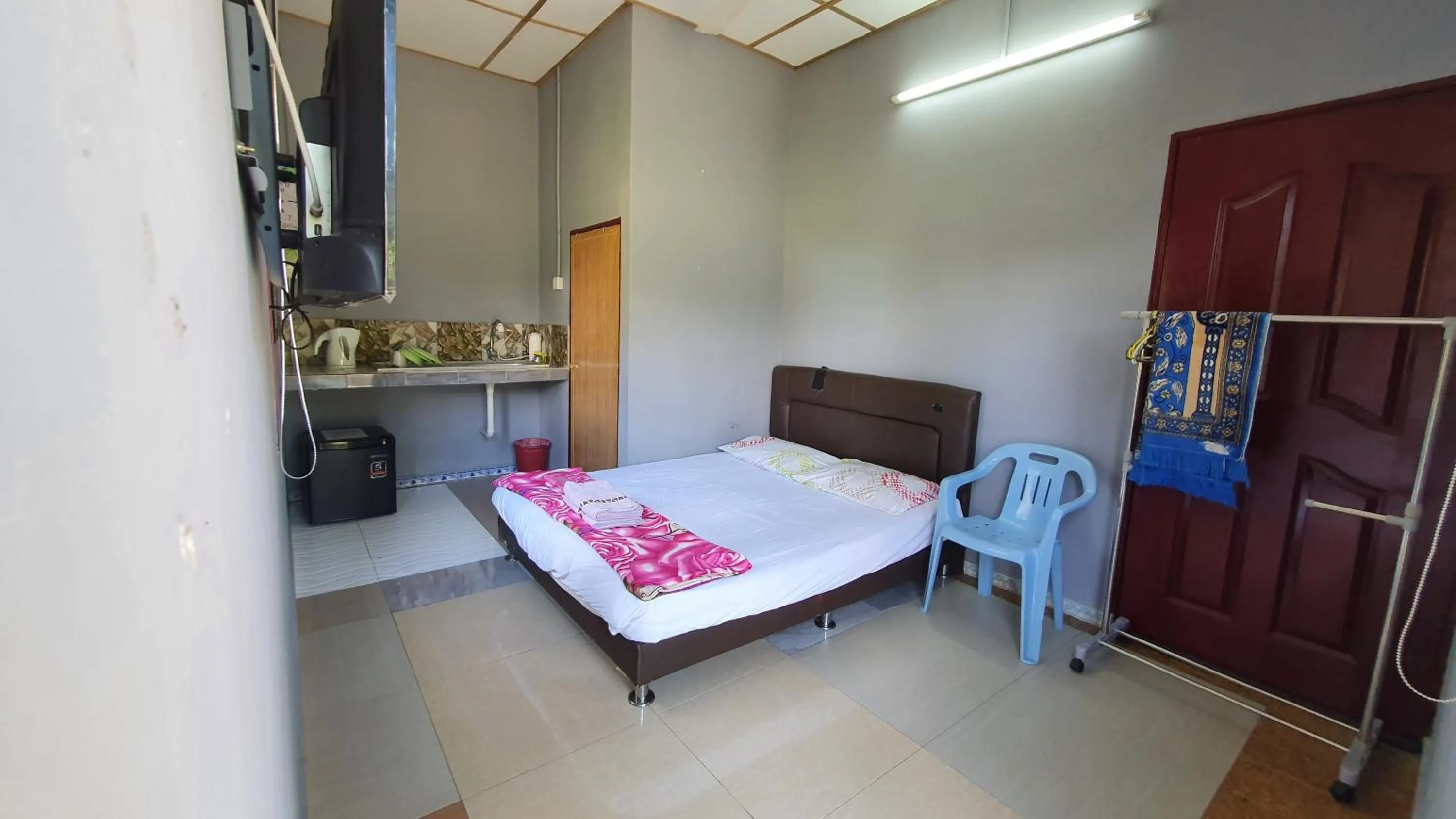 Bed in Chalet Kampong Semawar