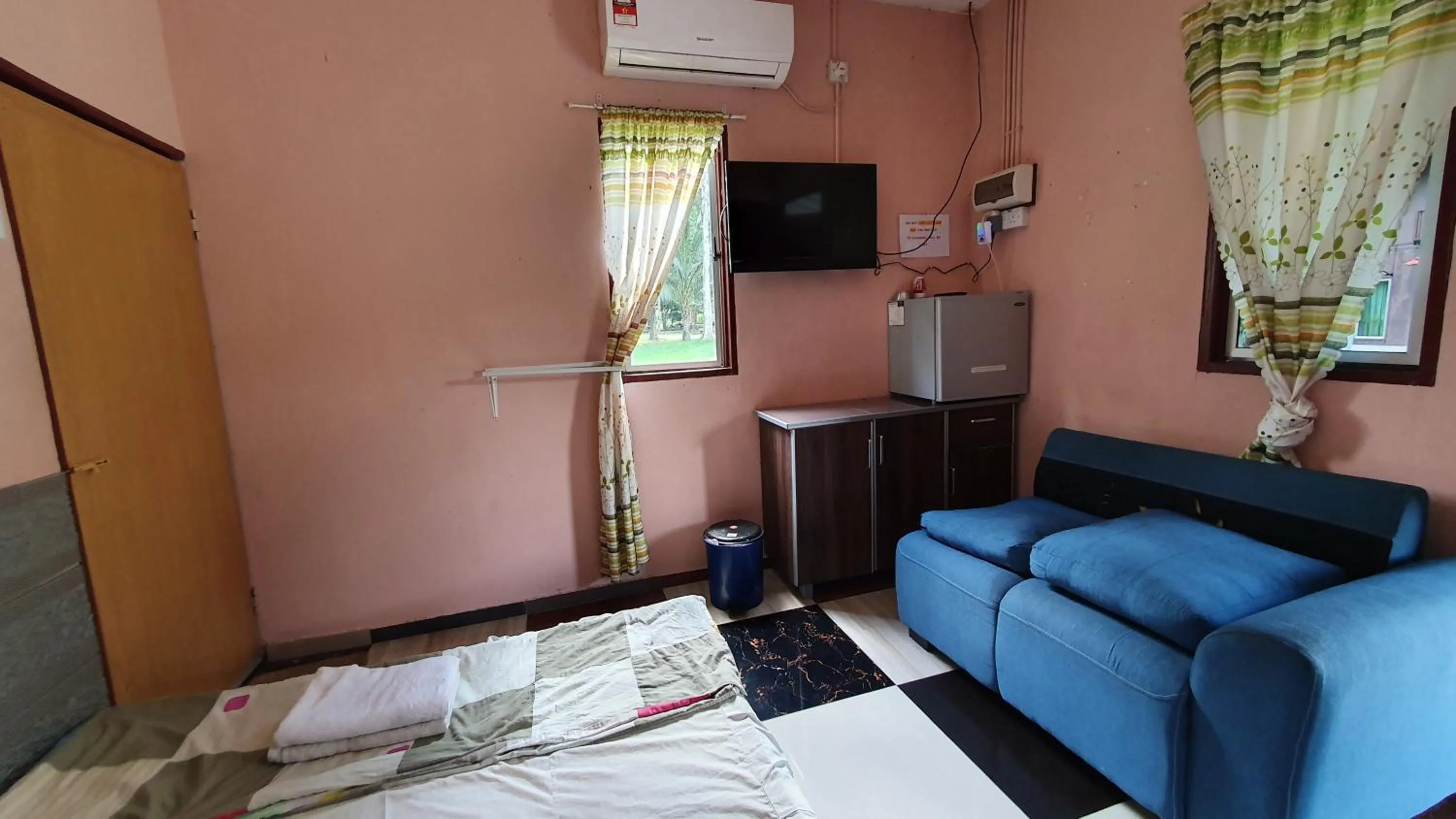 Bed in Chalet Kampong Semawar