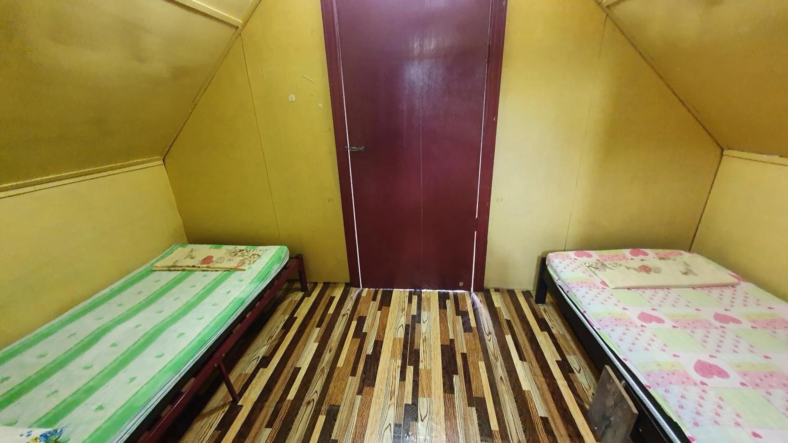 Bed in Chalet Kampong Semawar