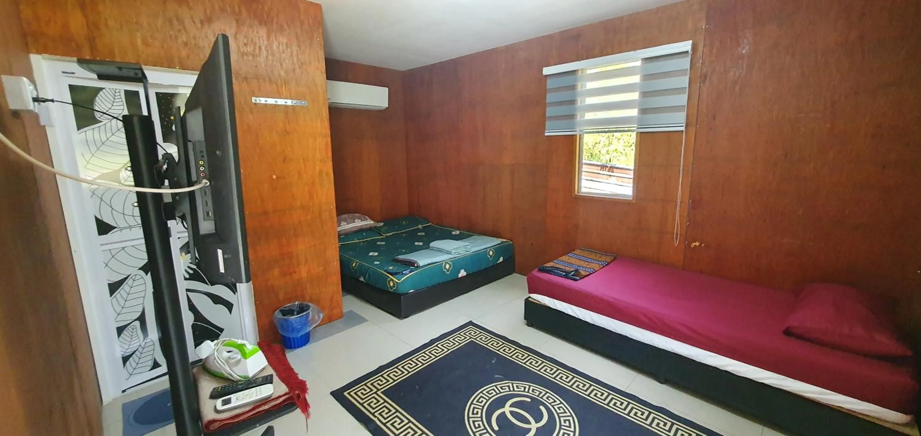 Bed in Chalet Kampong Semawar