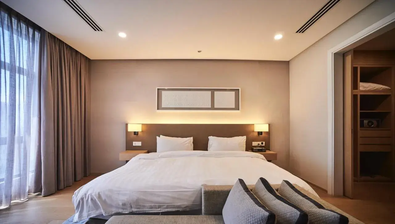 Bed in 188 Suites by NamaStay Bed in 188 Suites by NamaStay