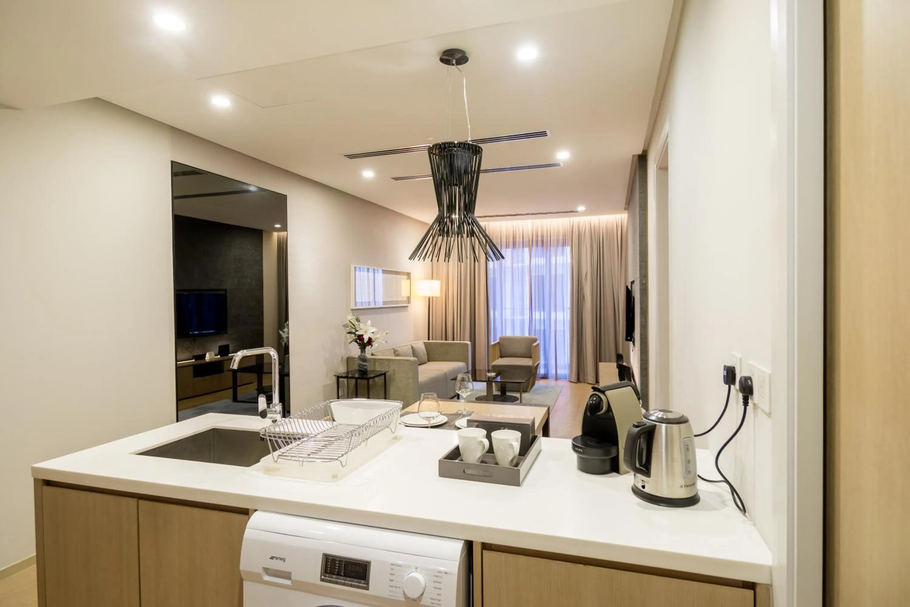 Kitchen or kitchenette in 188 Suites by NamaStay