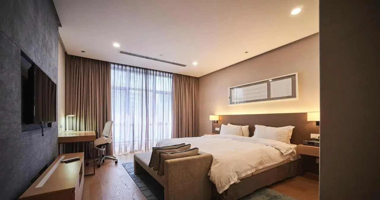 Bed in 188 Suites by NamaStay Bed in 188 Suites by NamaStay