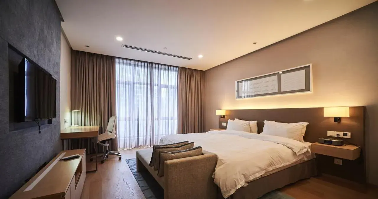 Bed in 188 Suites by NamaStay Bed in 188 Suites by NamaStay