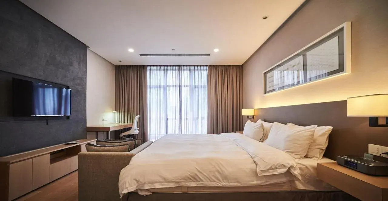 Bed in 188 Suites by NamaStay Bed in 188 Suites by NamaStay