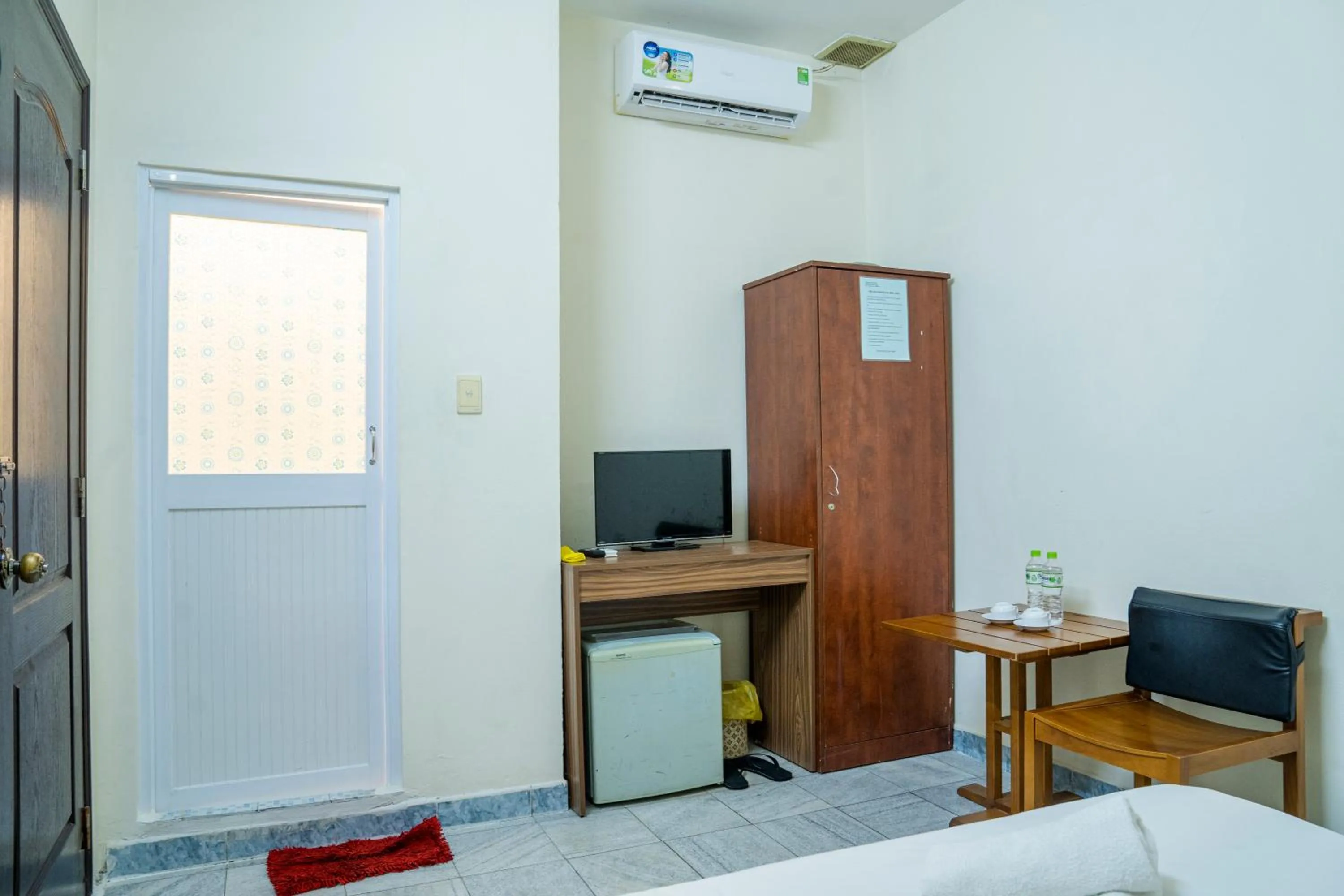 TV and multimedia, Bed in Aqua Kim Long Hotel