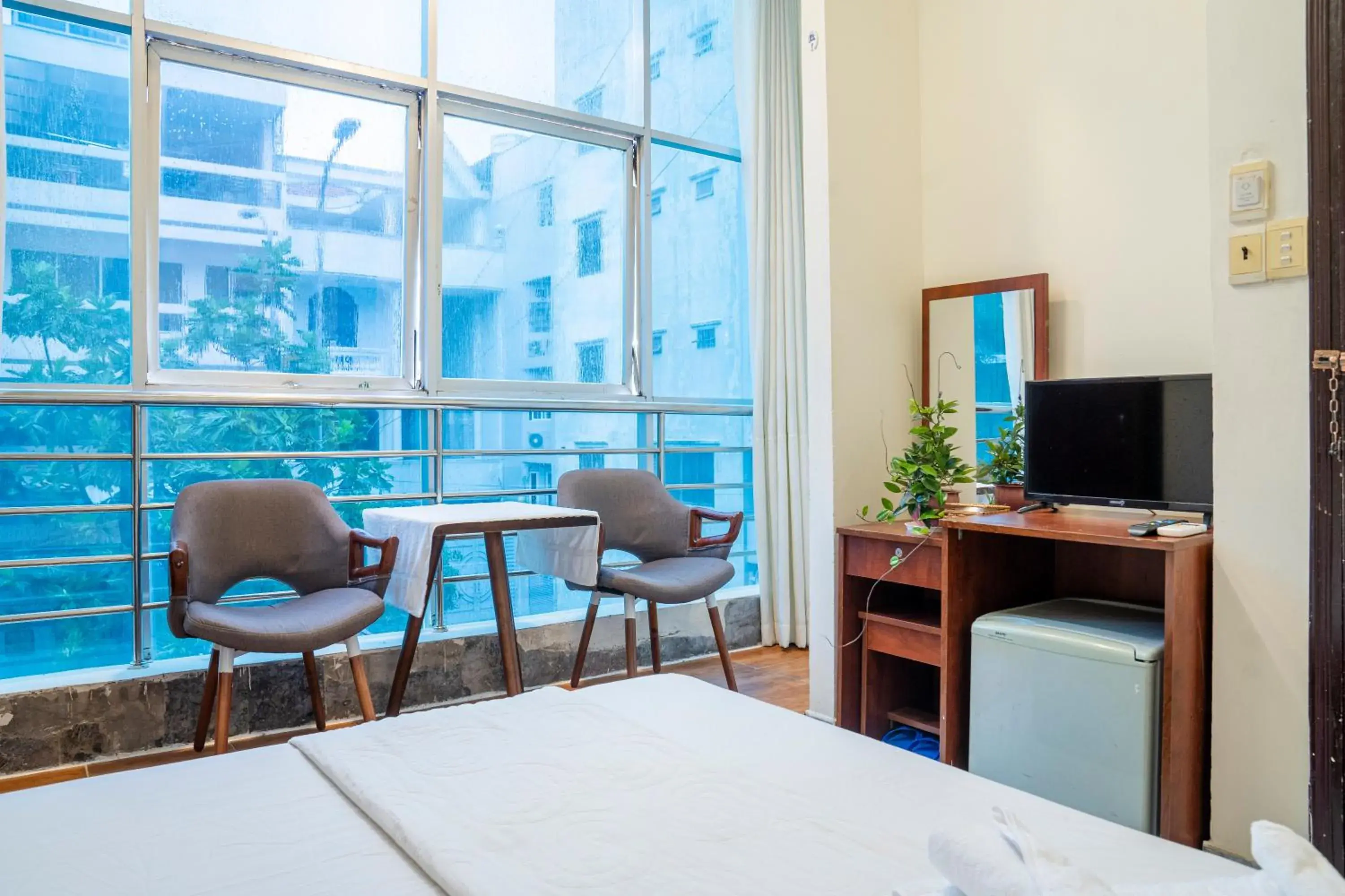 Seating area, Bed in Aqua Kim Long Hotel Seating area, Bed in Aqua Kim Long Hotel