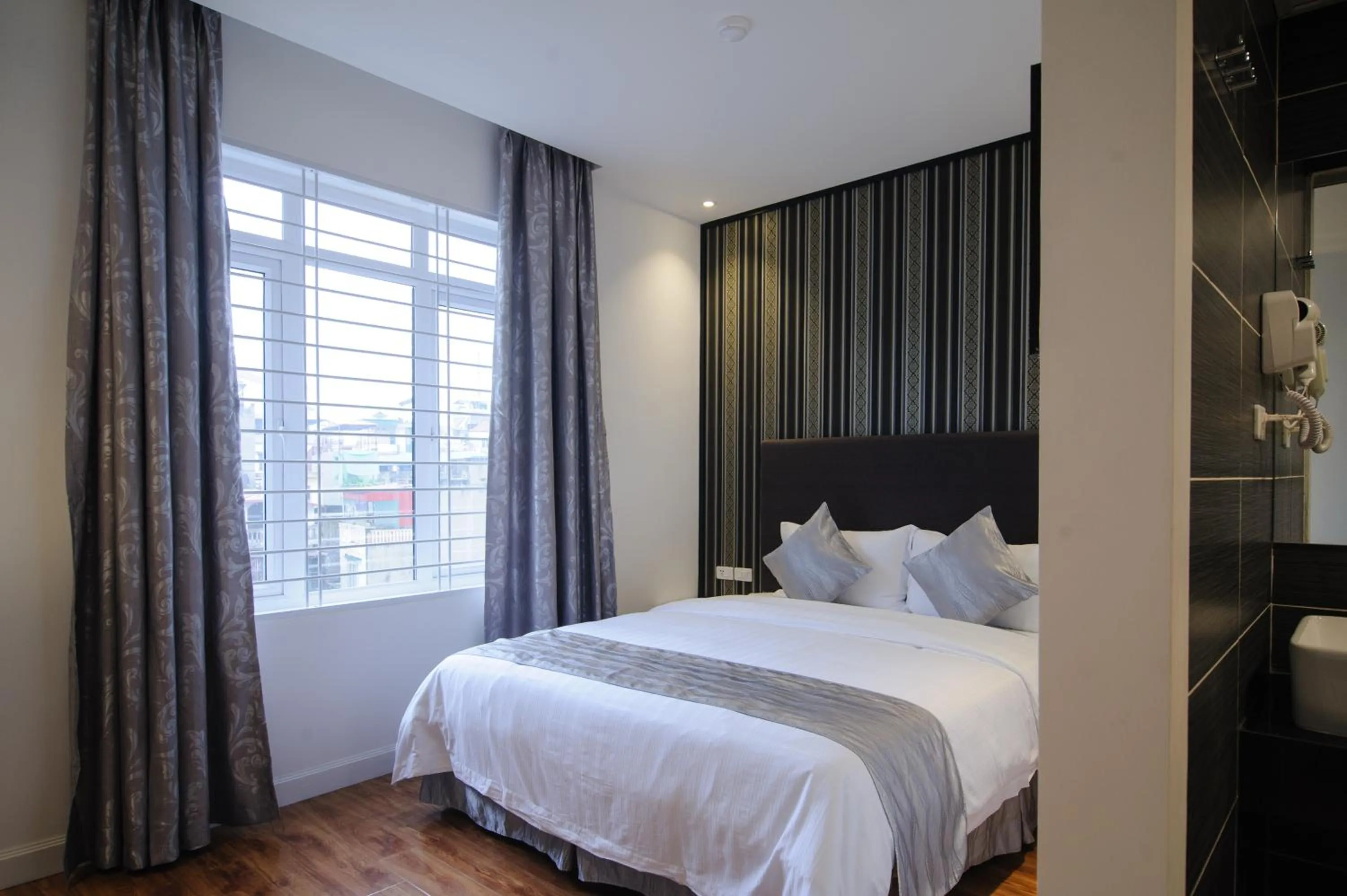 Bed in Riverside Boutique Hotel