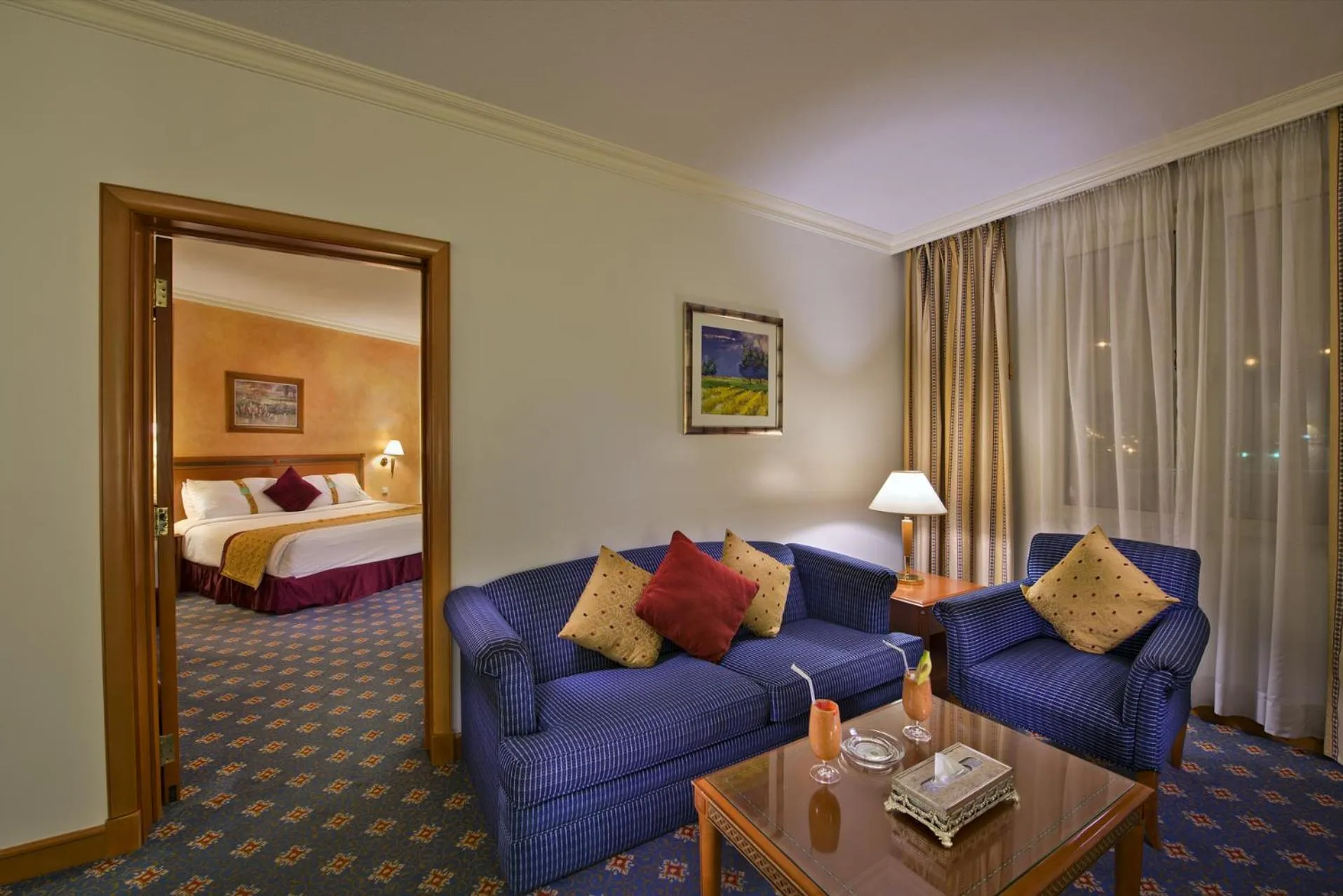 Seating area, Bed in Holiday Inn Al Khobar by IHG