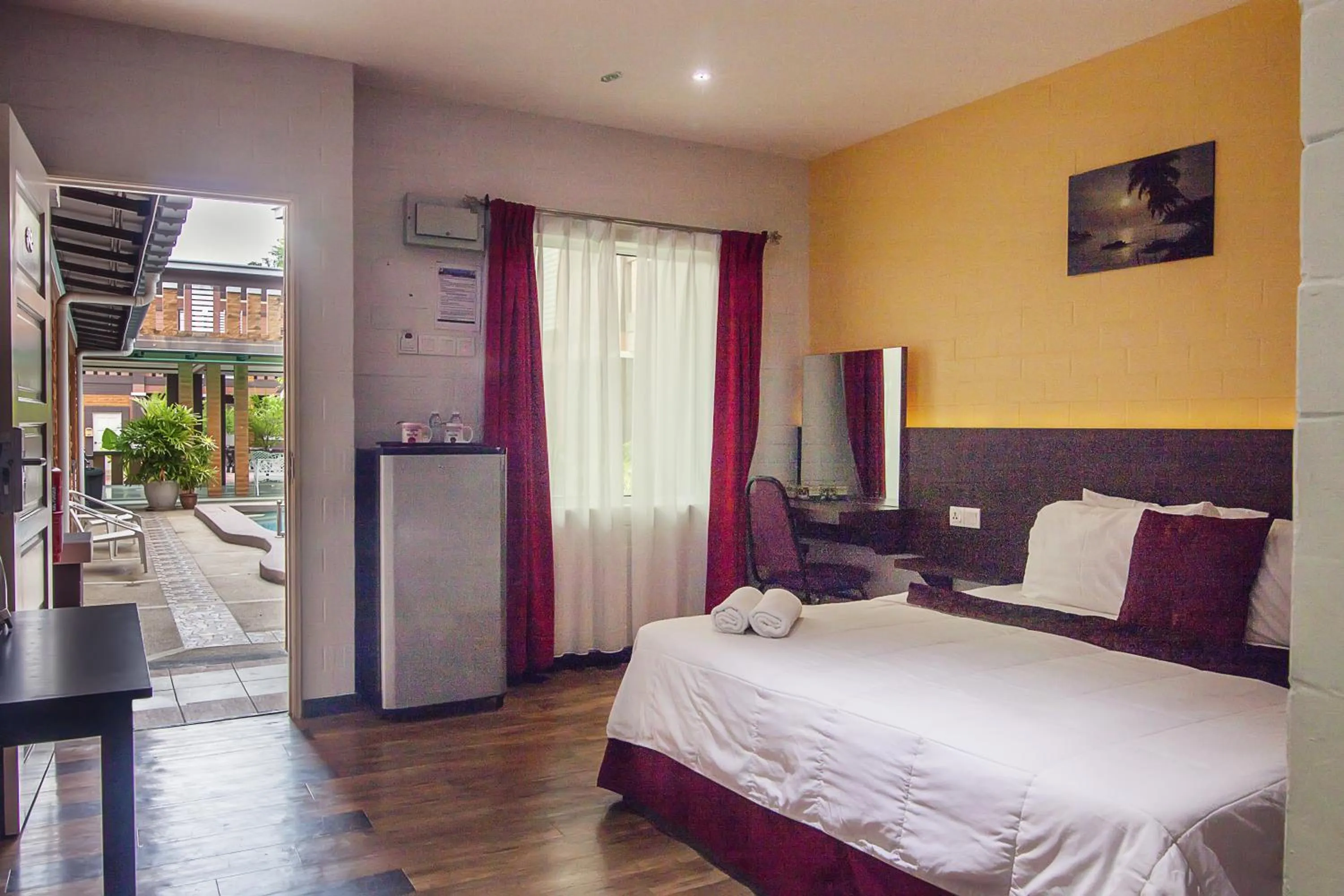 Bed in Myvilla Langkawi Hotel