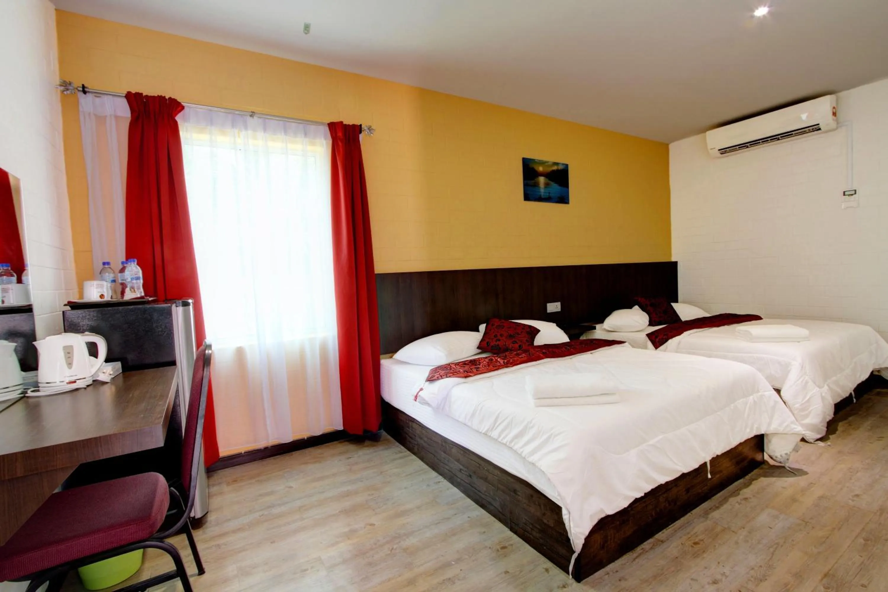 Bed in Myvilla Langkawi Hotel