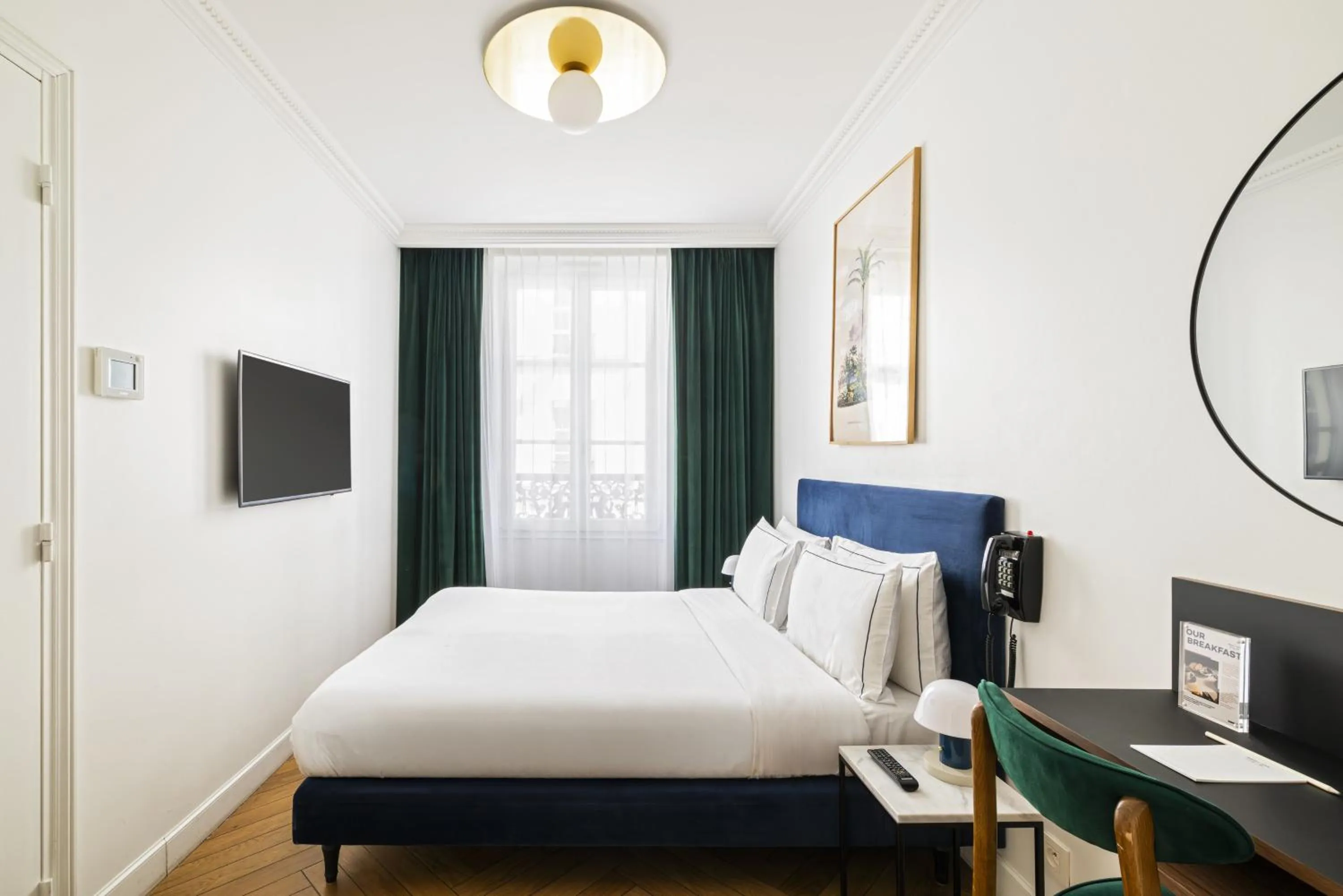 Photo of the whole room, Bed in Hotel Rendez-Vous Batignolles