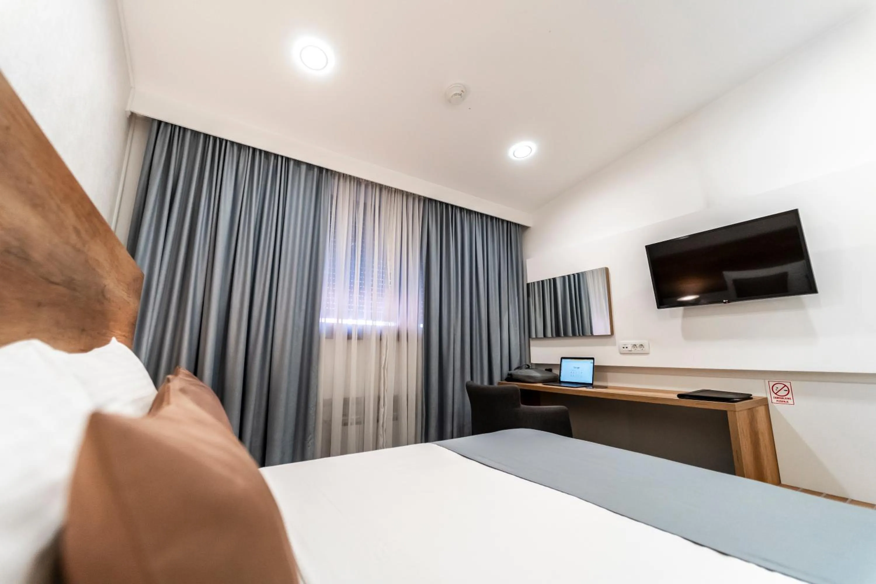 Bed in Hotel Santiny